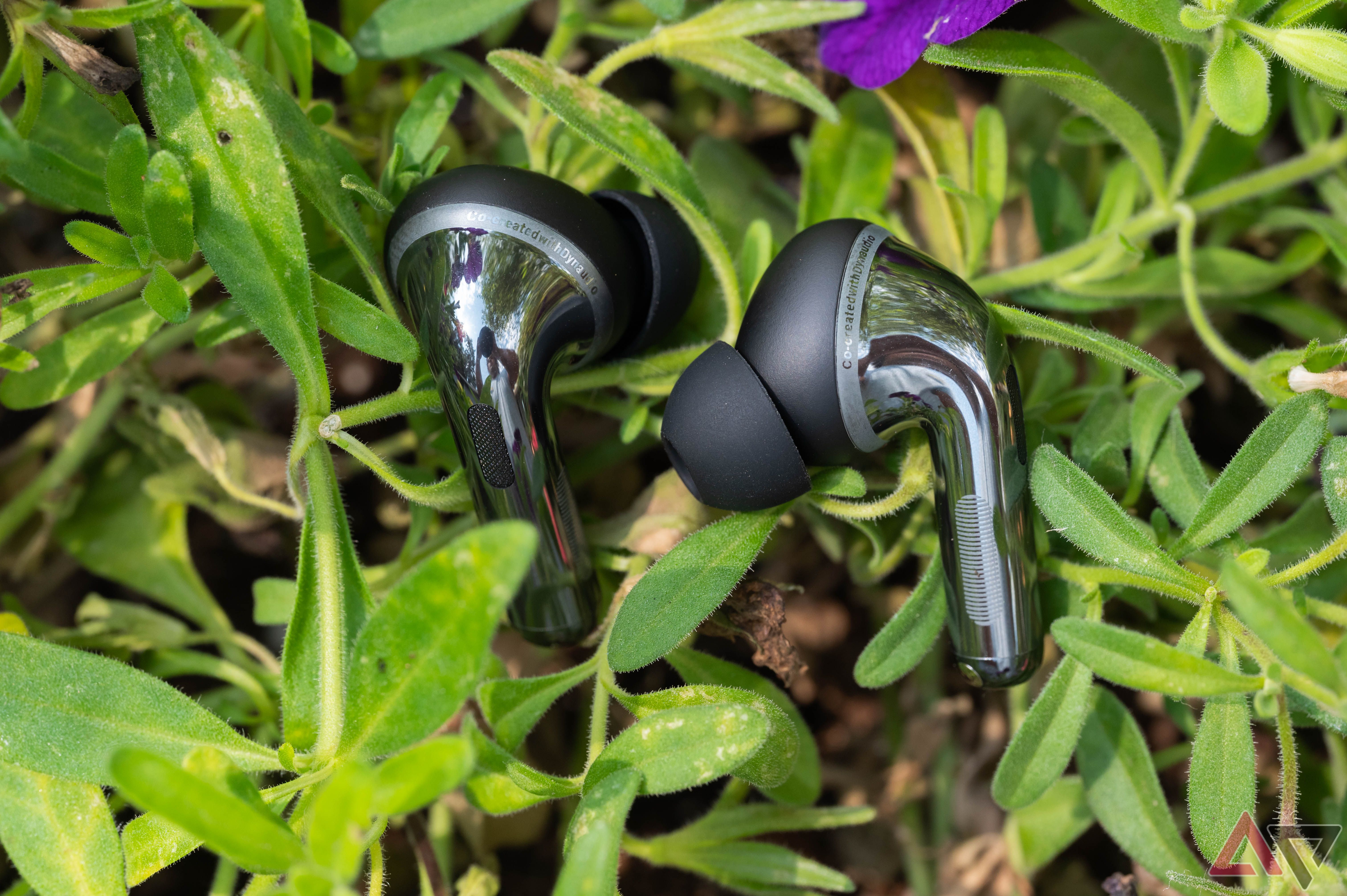 OnePlus Buds Pro 3 earbuds in vegetation