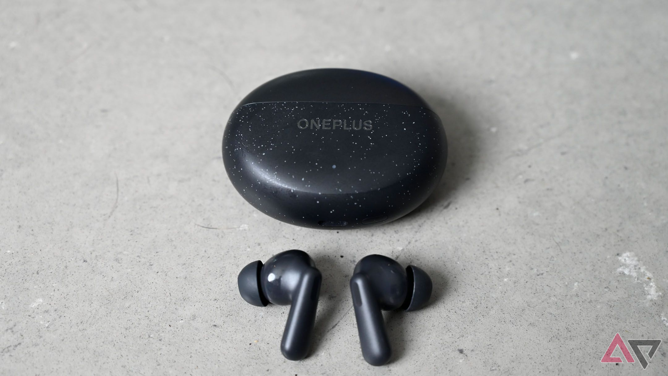 OnePlus Nord Buds 3 Pro earbuds on light gray marble counter