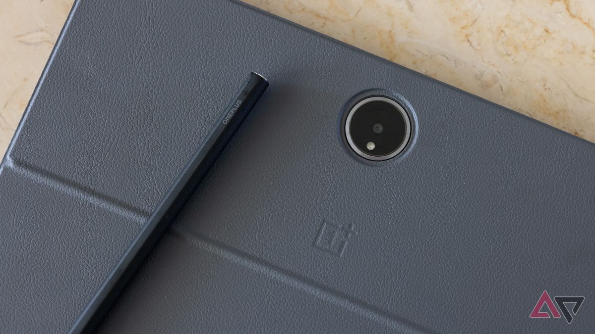 The back of the OnePlus Pad 2 with a stylus and Smart Cover