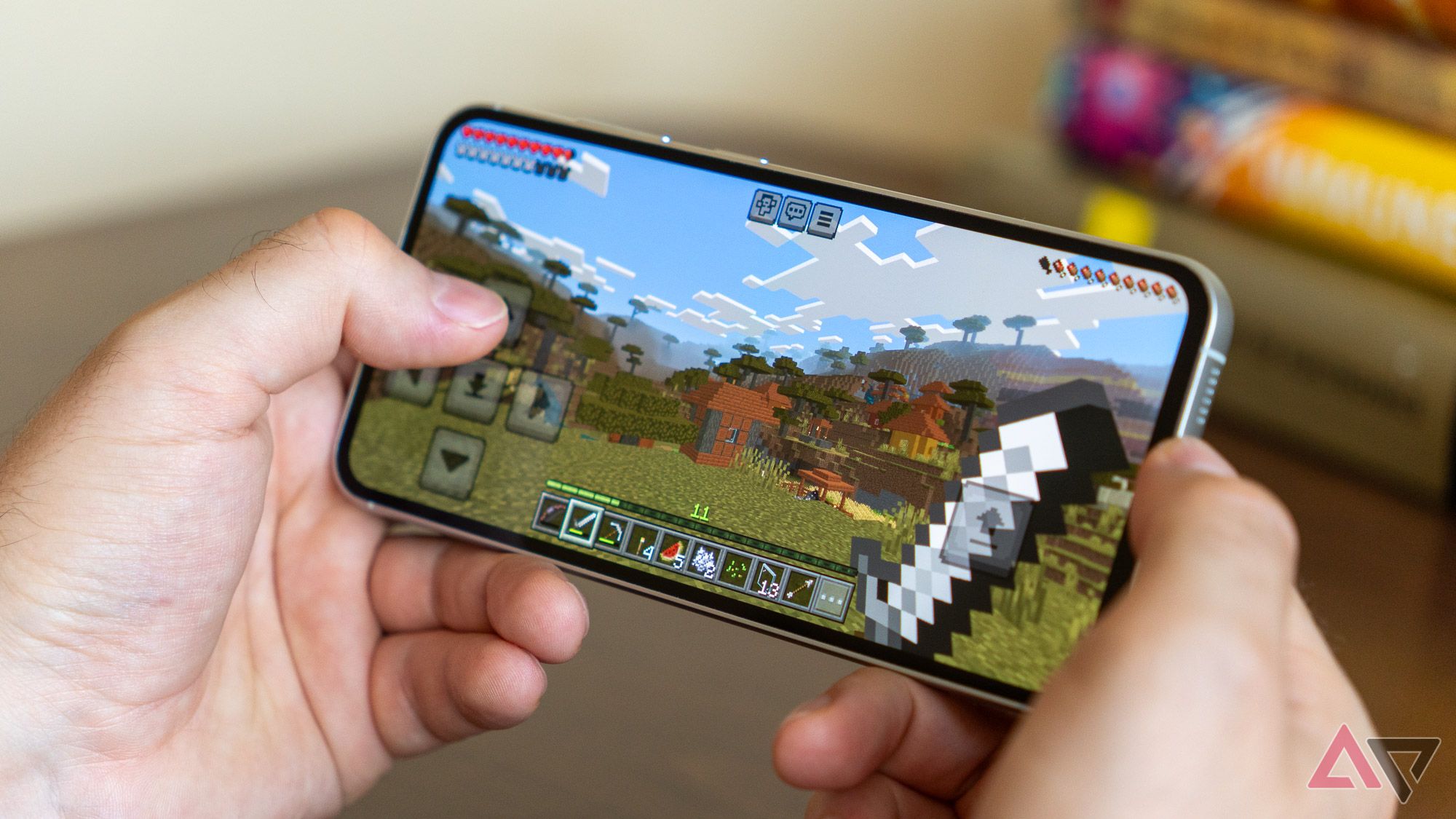 samsung galaxy s23 fe running minecraft playing in hand