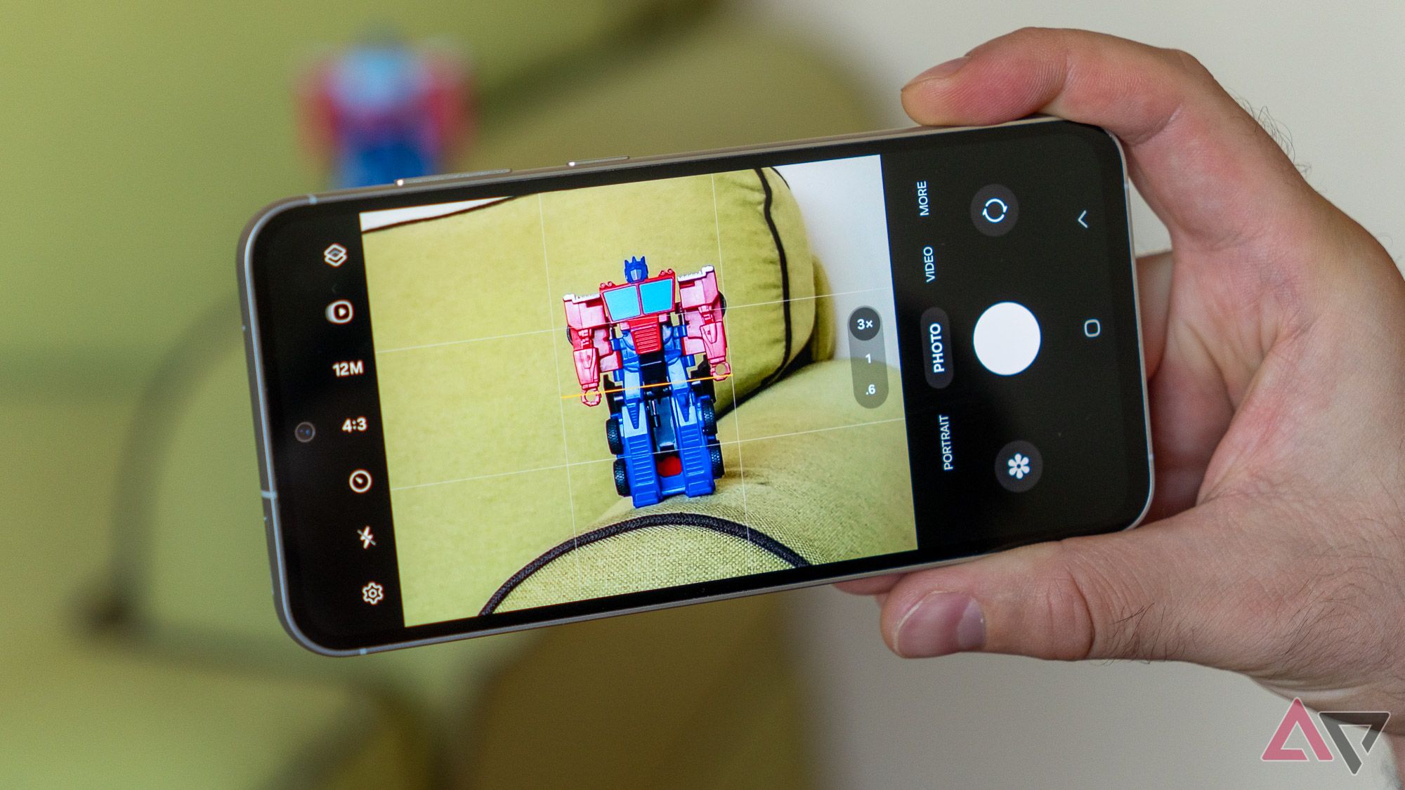 samsung galaxy s23 fe taking a photo of toy with camera app open