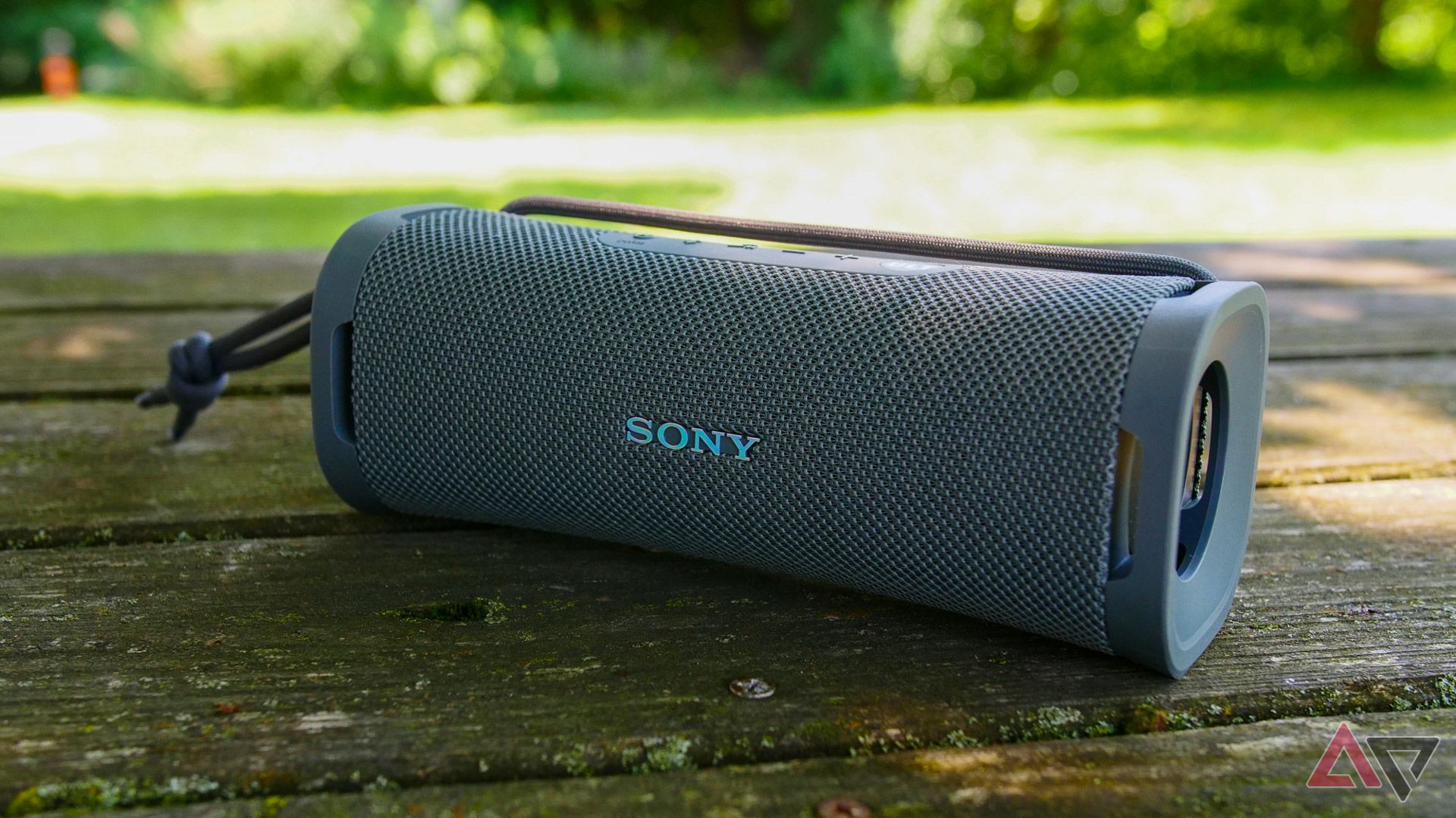 The Sony Ult Field 1 speaker sitting on a park picnic table.