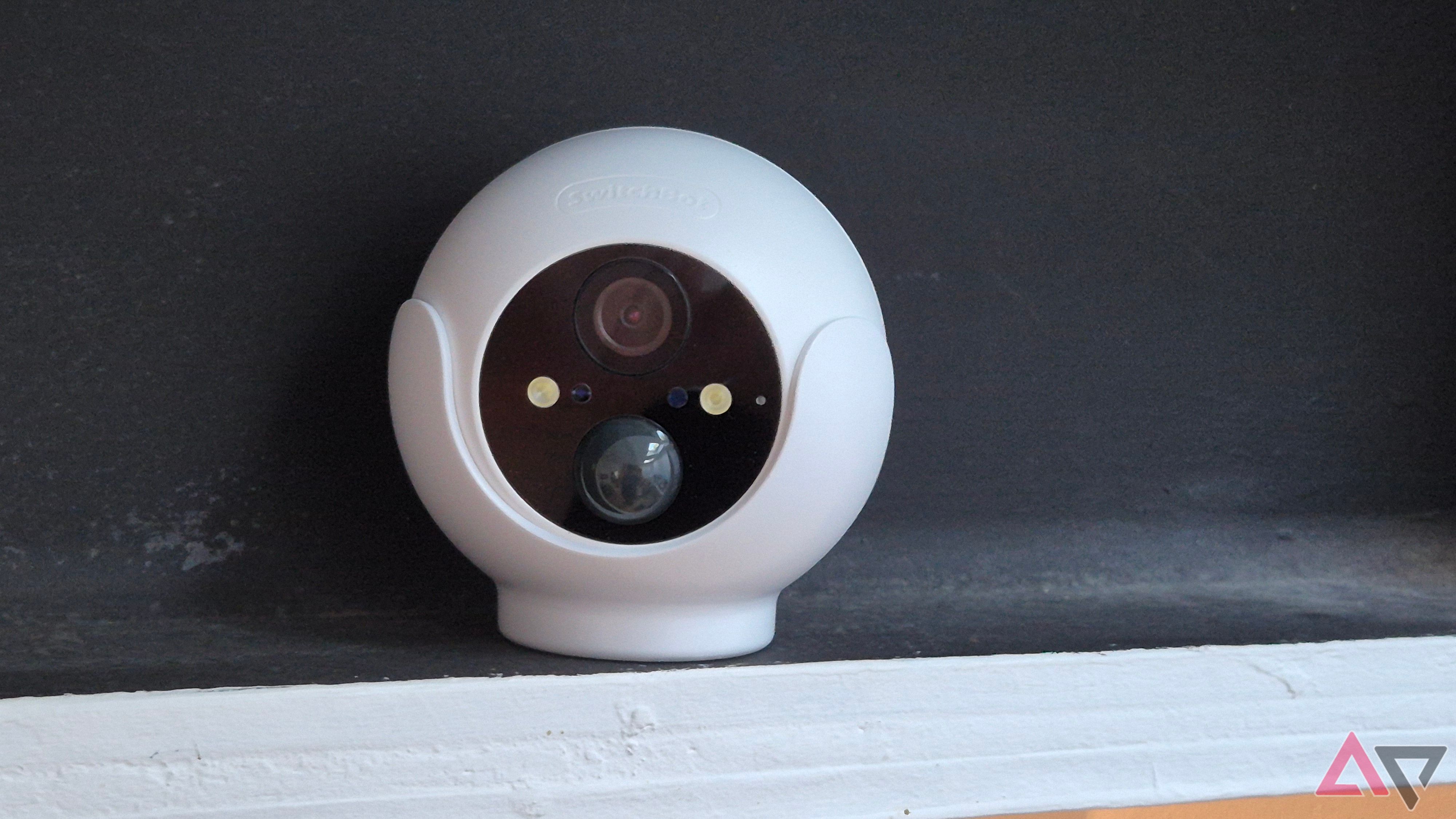 SwitchBot Outdoor Security Cam 2K on a beam