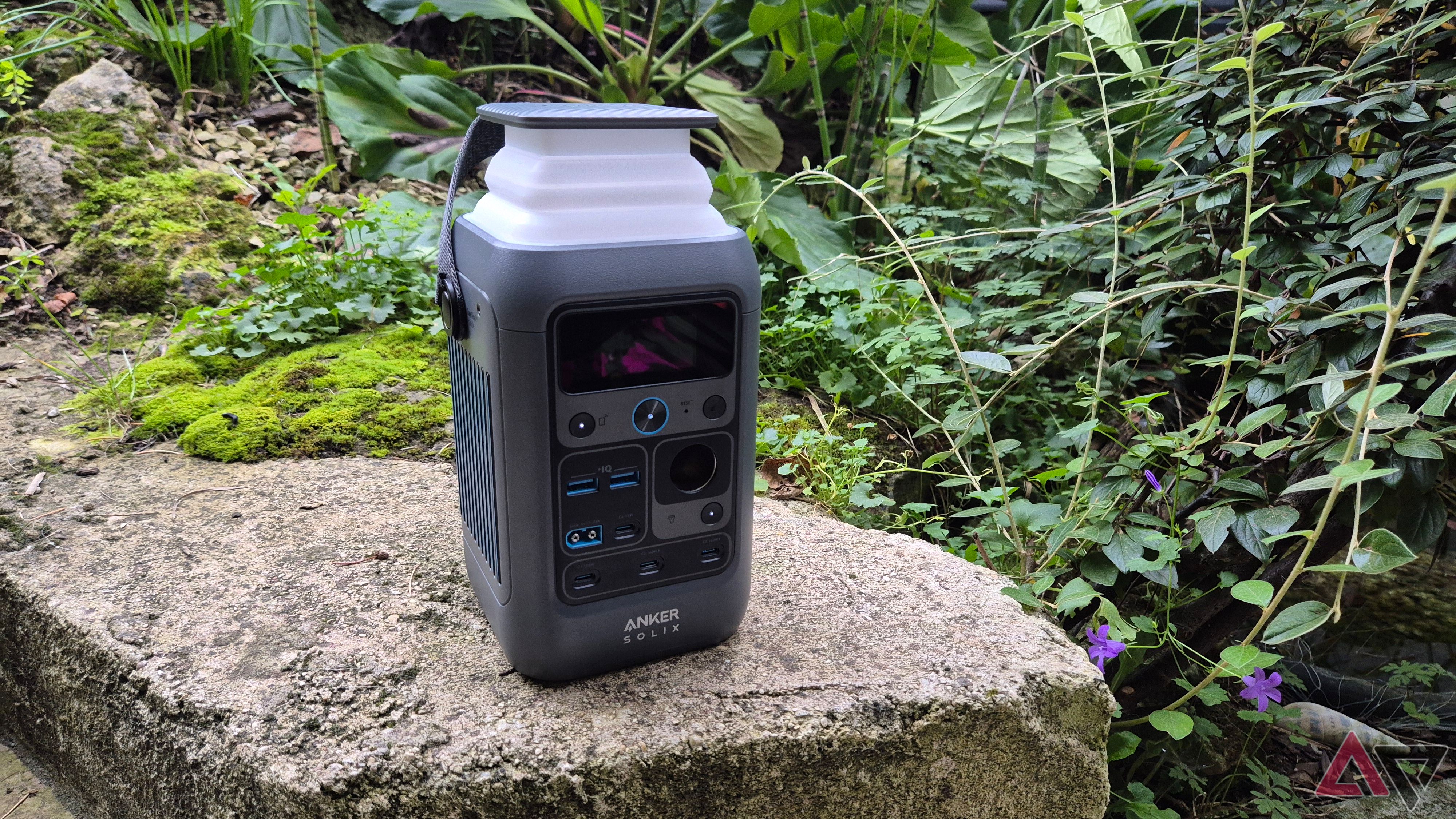 Anker C300 DC on a rock in a garden