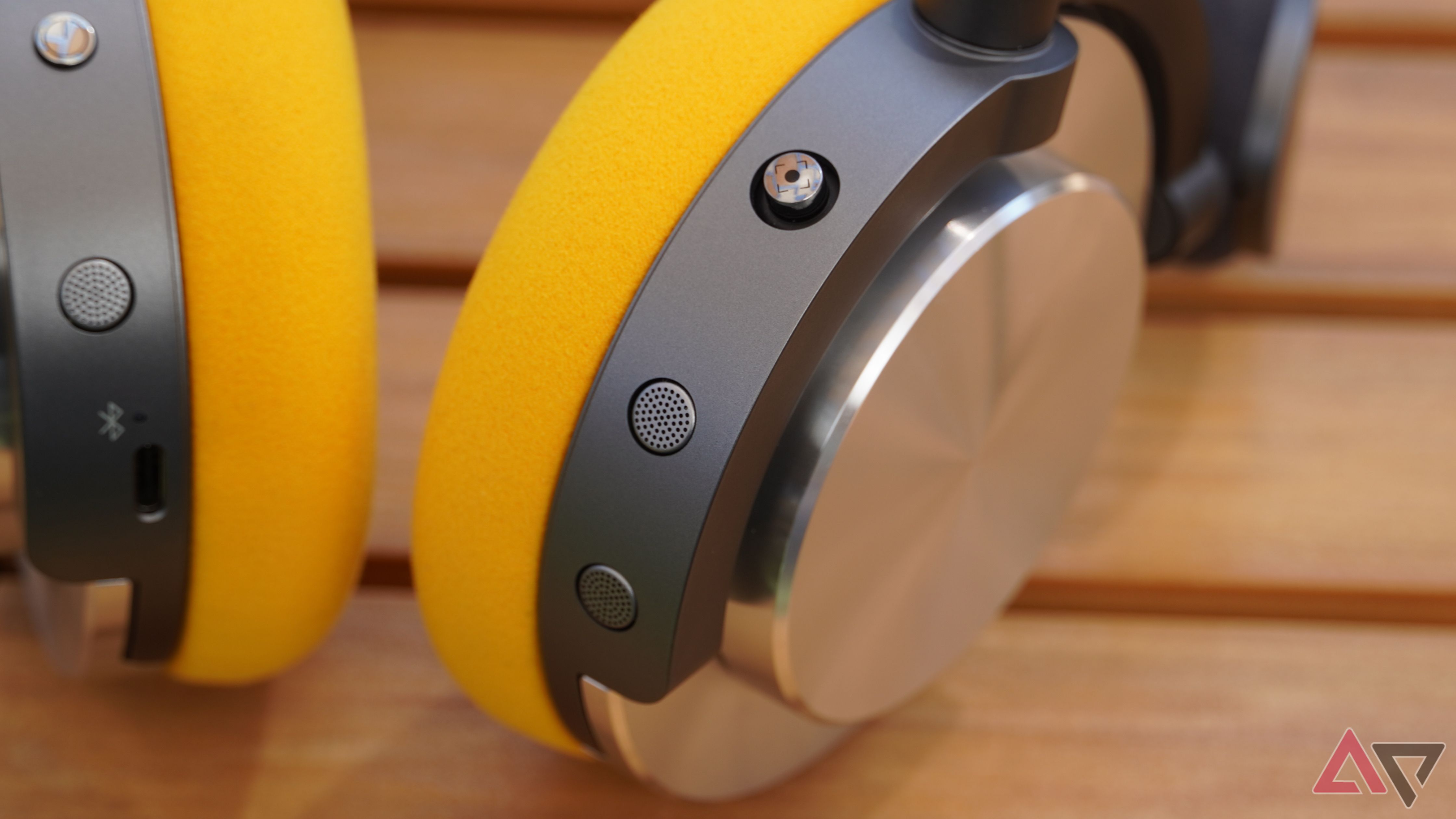 A close-up at the Dyson OnTrac ear cups and controls.