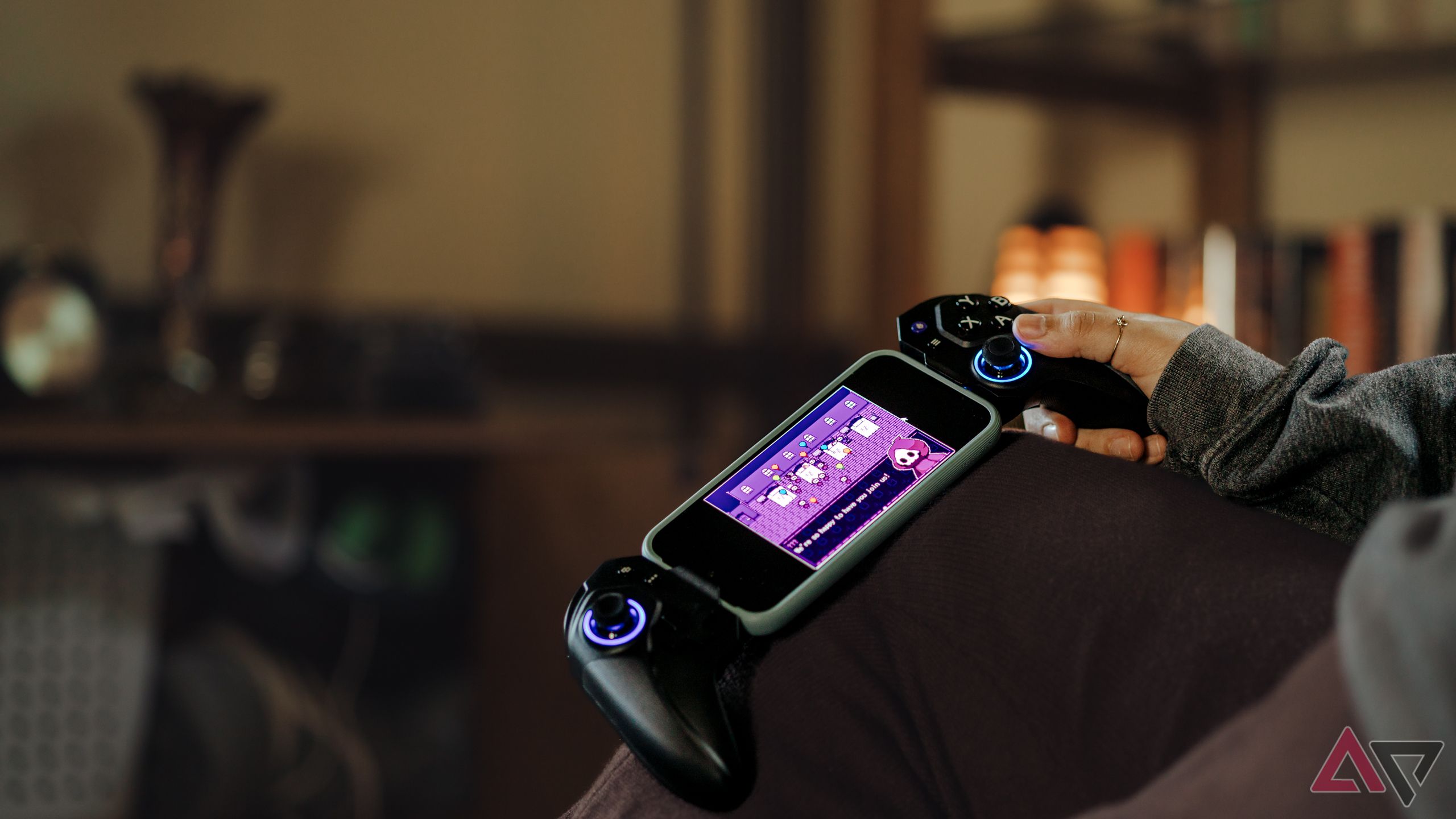 Person holding ELO Vagabond mobile gaming controller