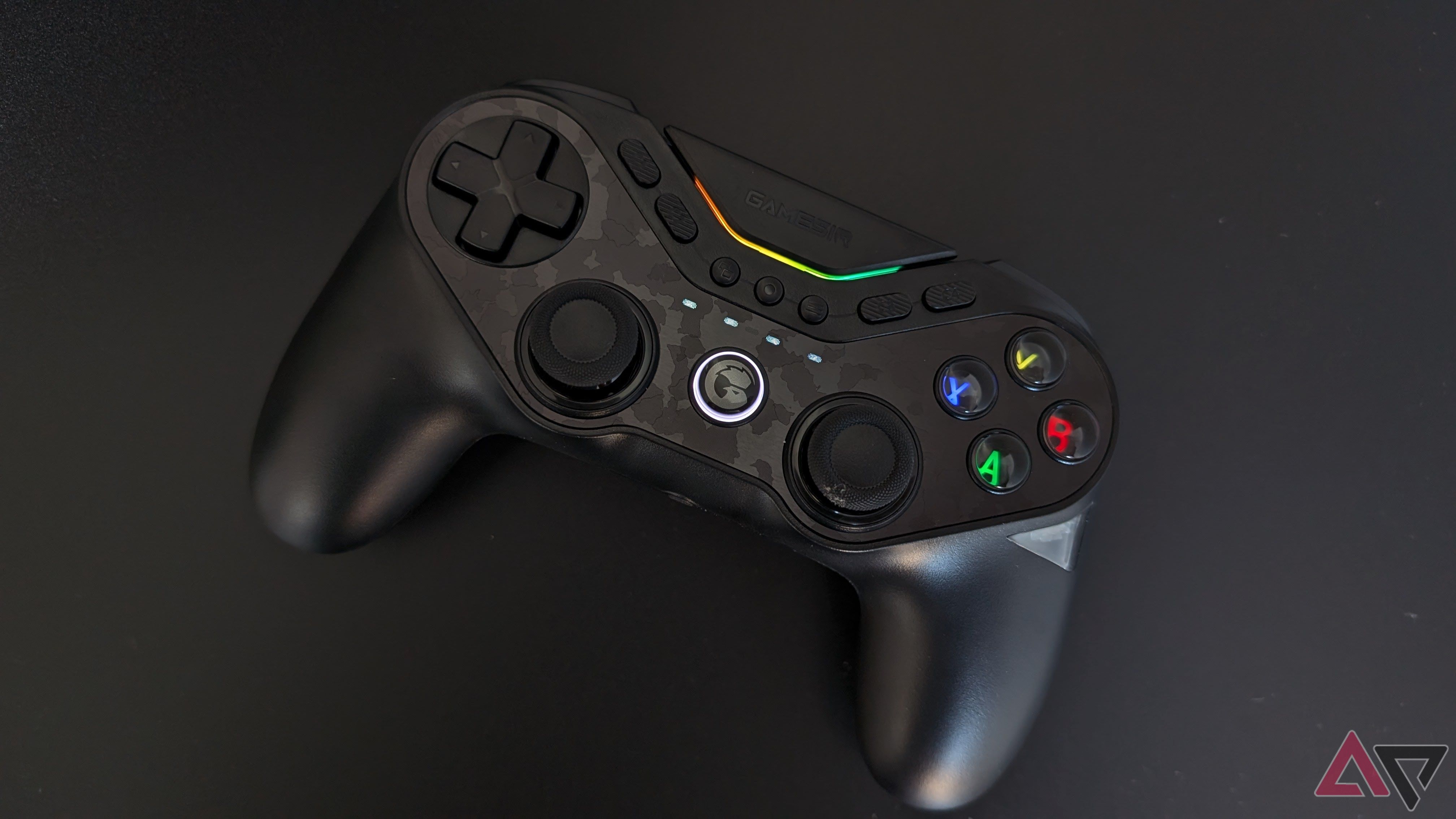 black gamesir controller on black surface