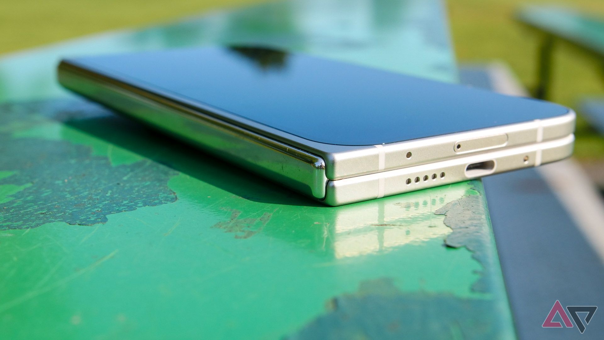 The Pixel 9 Pro Fold resting on a park bench.