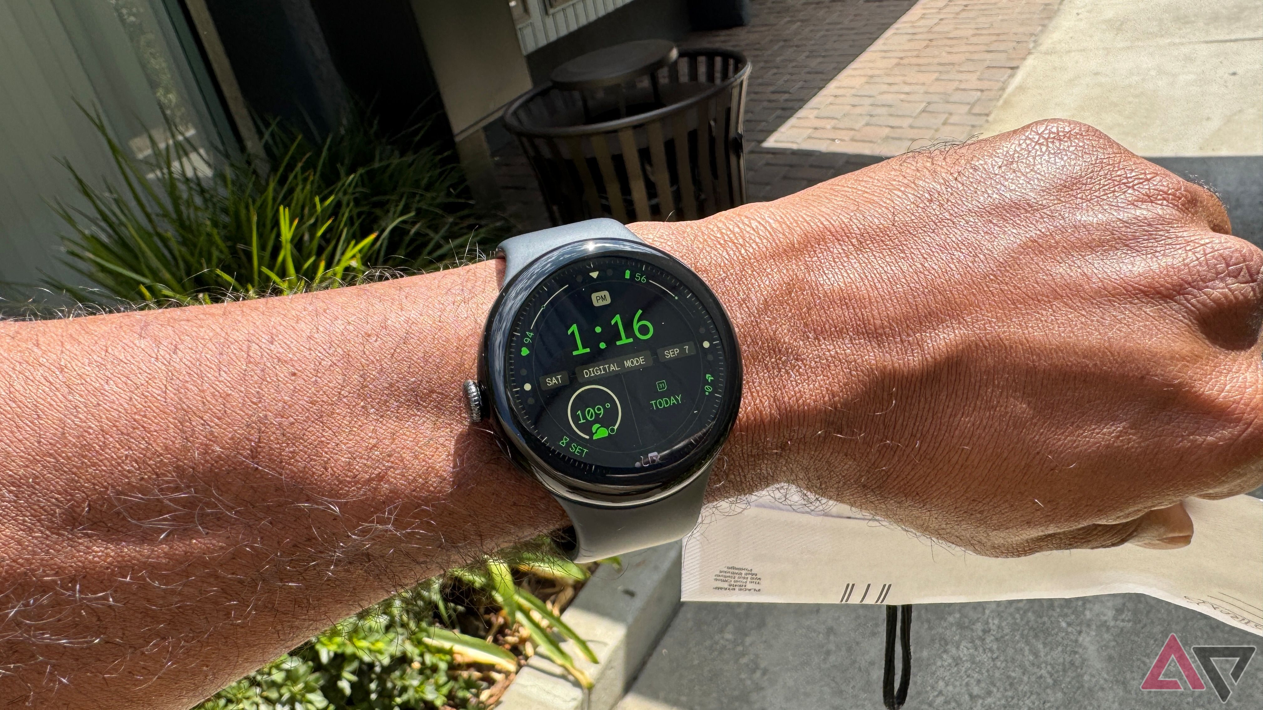 Google Pixel Watch 3 showing the Adventure watch face on a sunny day