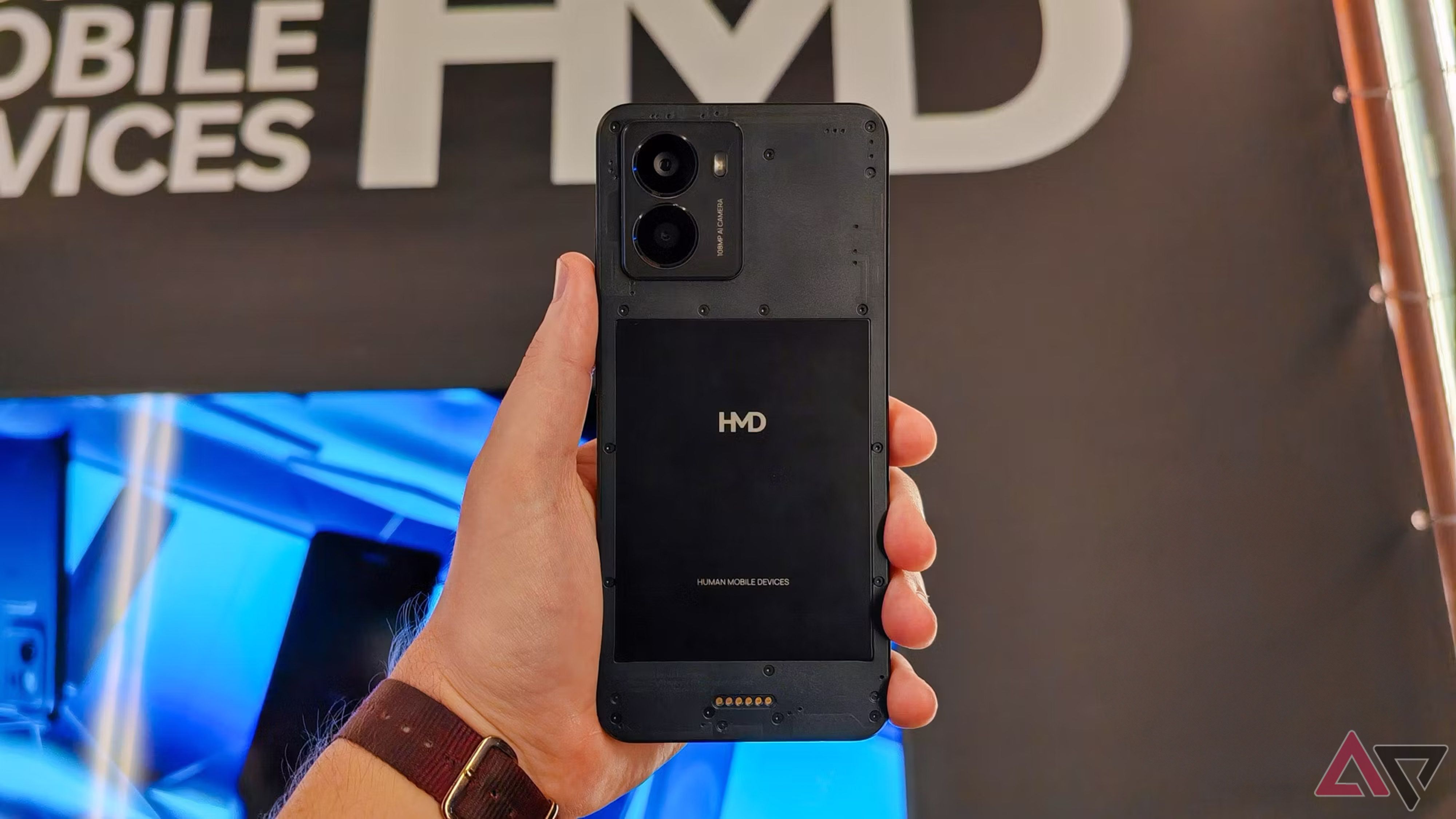 A picture of the back of the HMD Fusion held in a hand