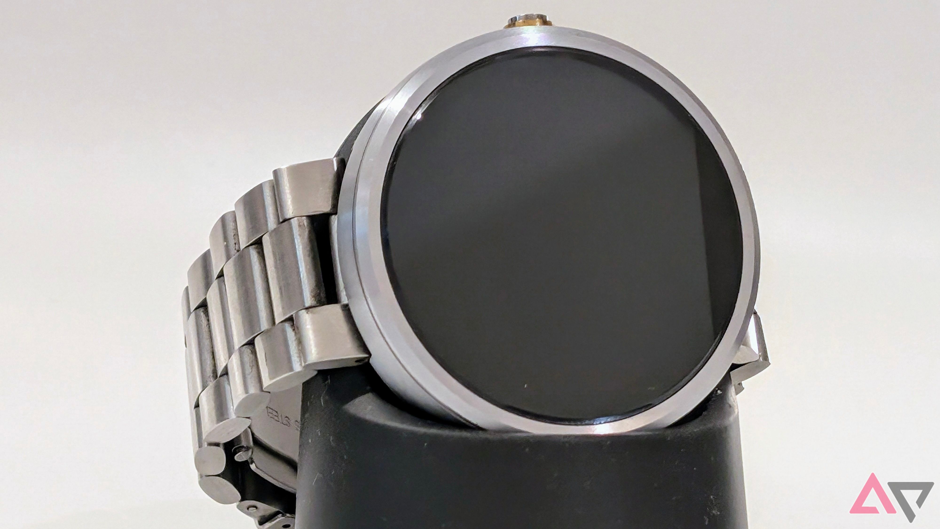 A photo of the Moto 360 on a charging dock