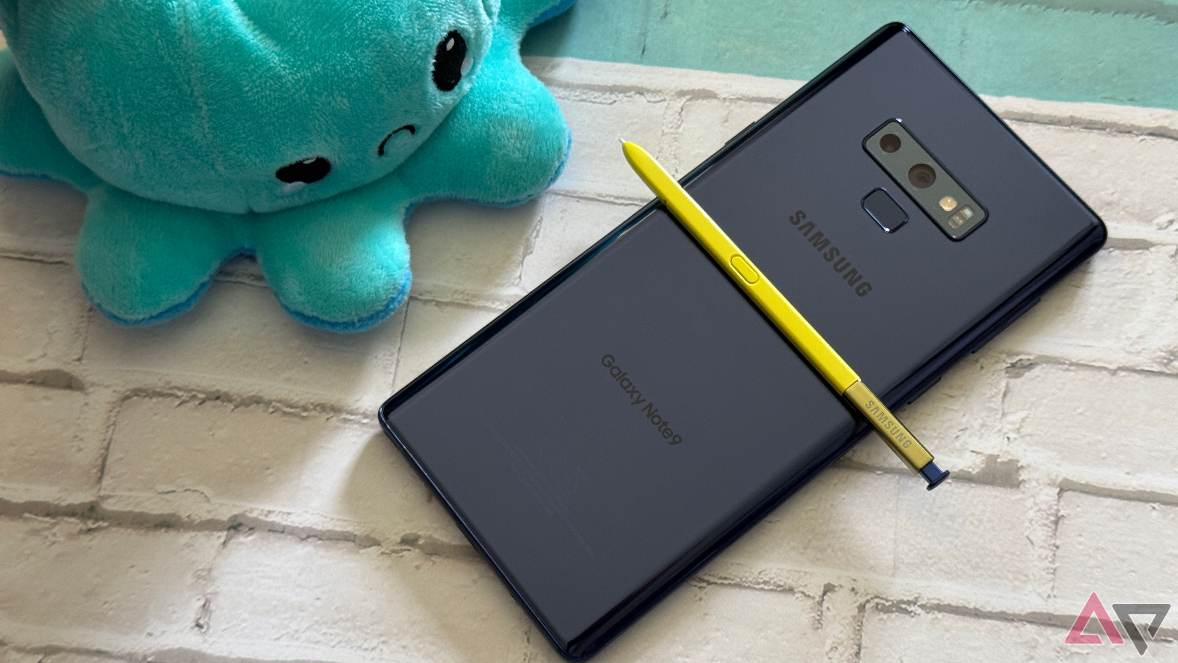 Samsung Galaxy Note 9 sitting next to a stuffed animal