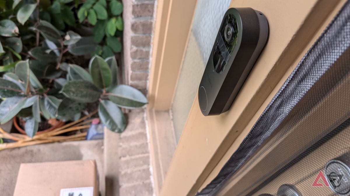 Reolink Battery Doorbell on a wall overlooking packages below