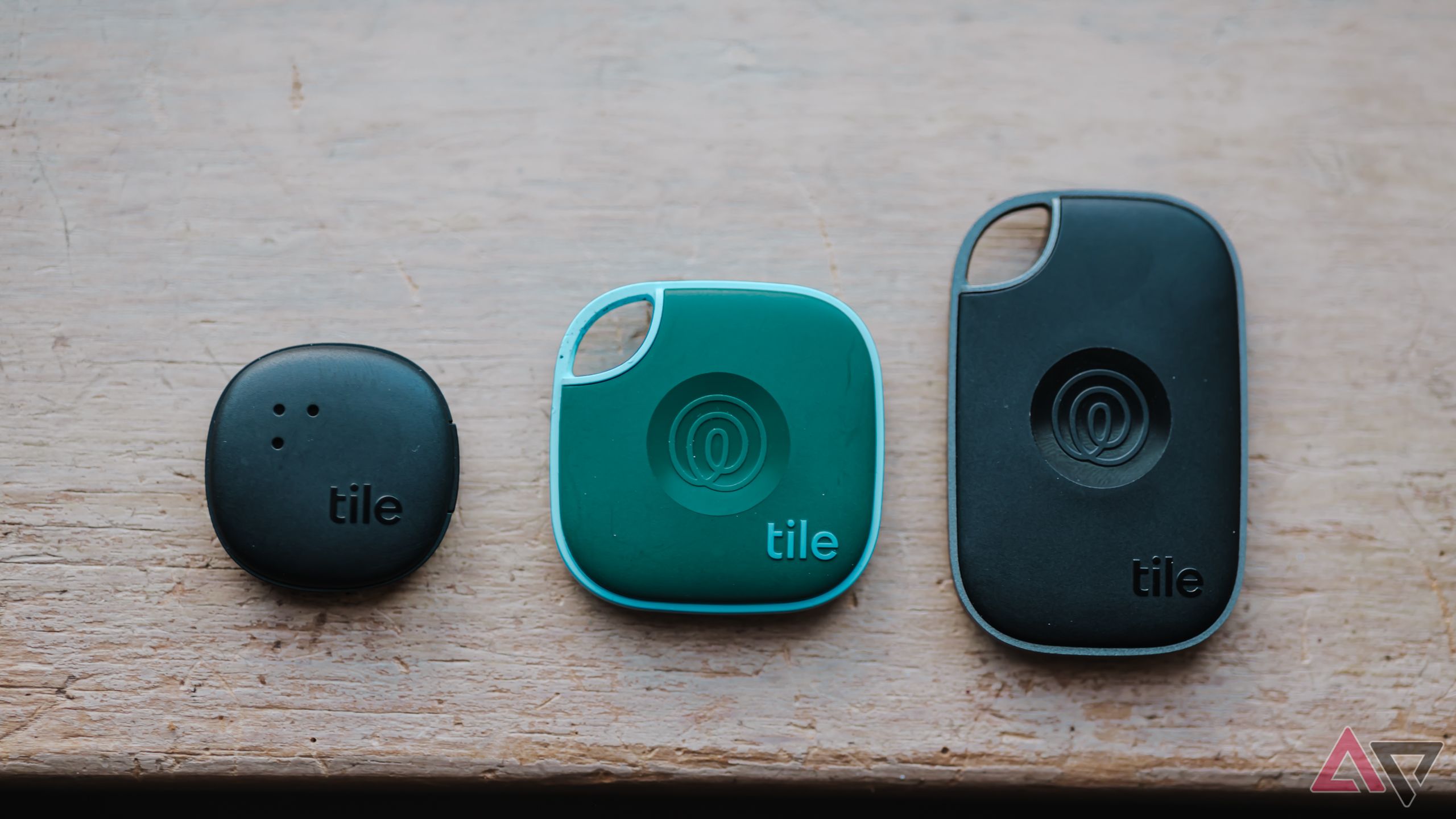 From left to right: 2024 Tile Sticker in black, 2024 Tile Mate in green, and 2024 Tile Pro in black. 