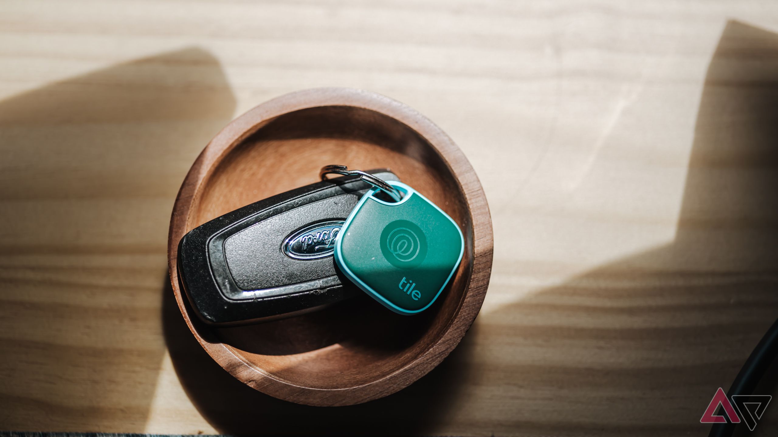 Tile Mate 2024 in green attached to Ford key fob