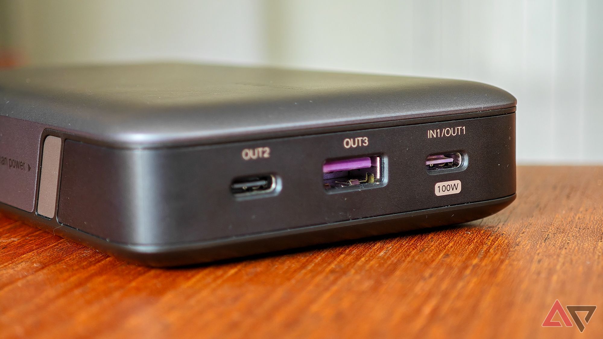 Ugreen Nexode 100W 20,000mah Bank on a wooden table showing USB ports