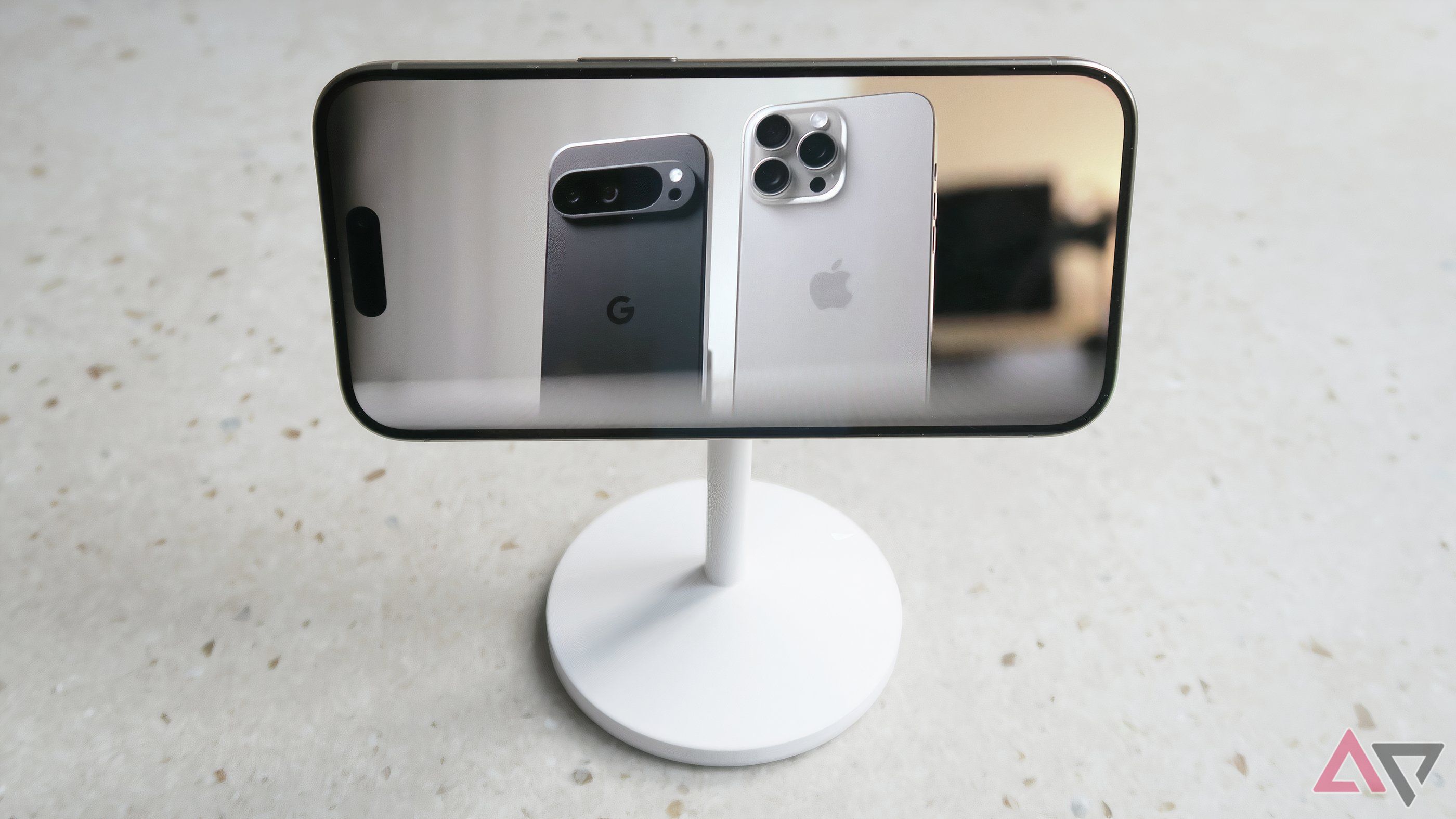 Anker Maggo Wireless Charger Stand with iPhone 15 Pro in the landscape