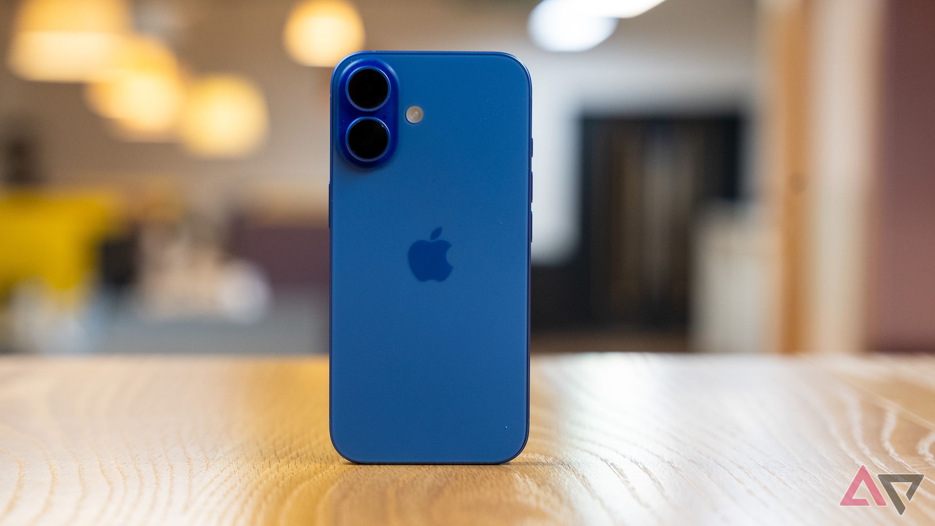 iPhone 16 in ultramarine on a table