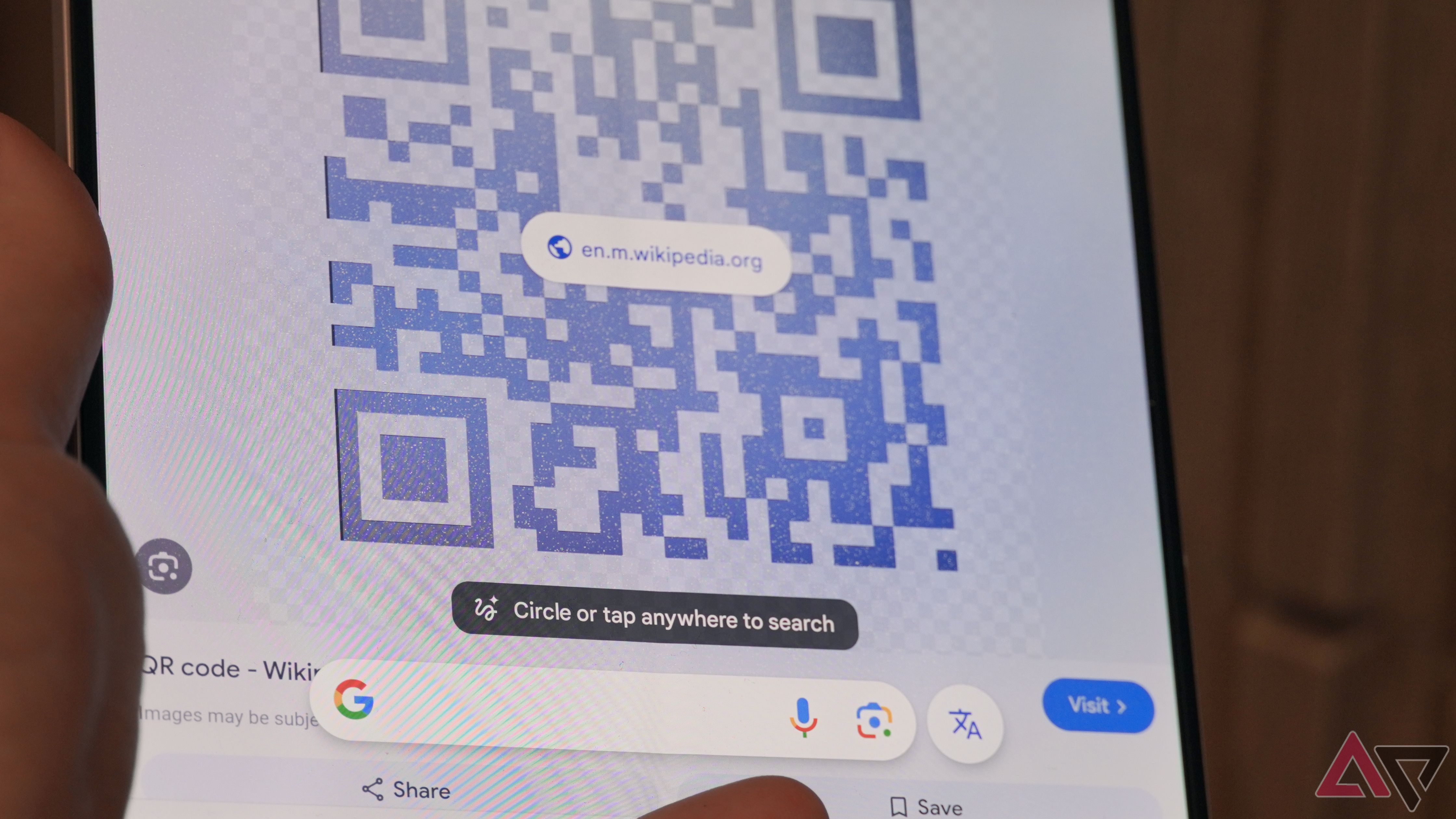 Circle to search by scanning QR code.