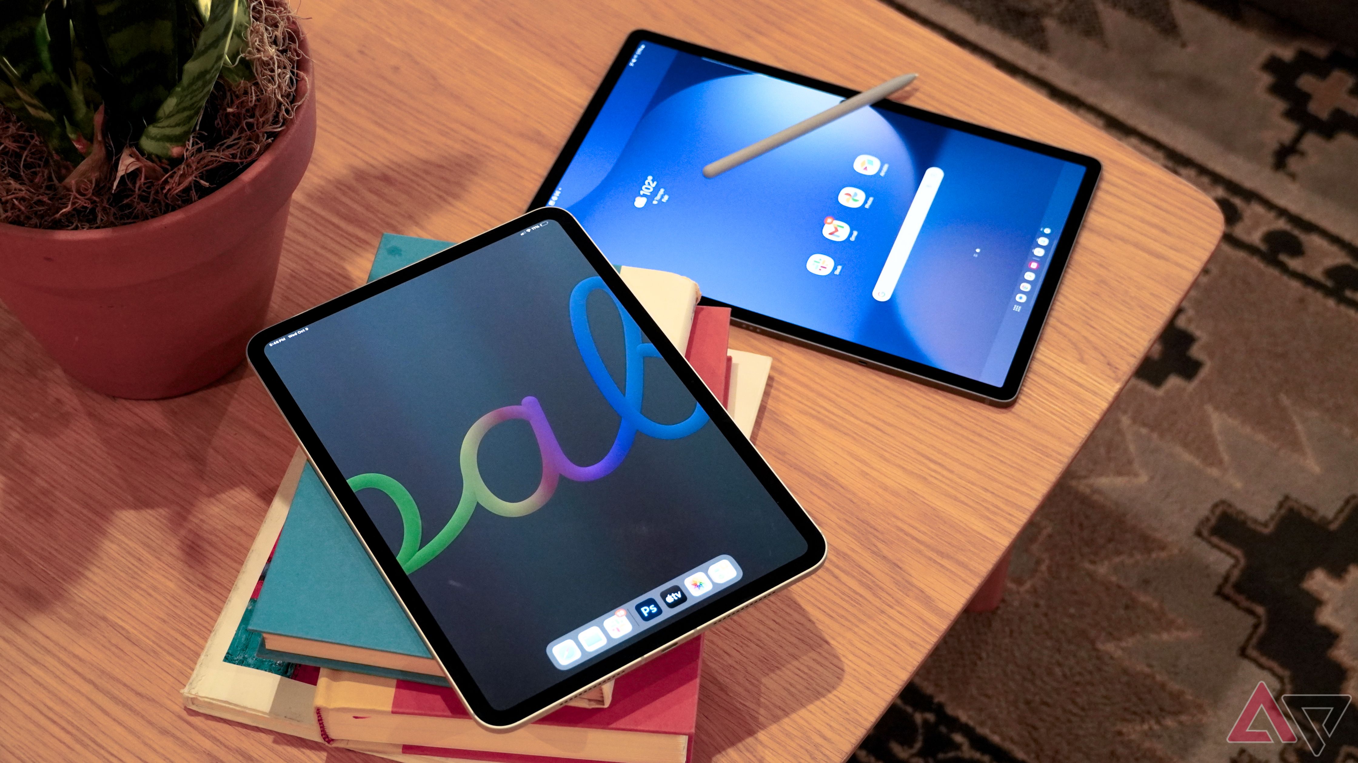 iPad Pro M4 next to Galaxy Tab S10+ with S Pen.