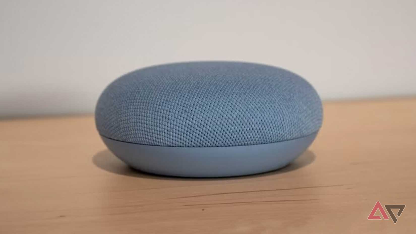 A Nest Mini on a table.