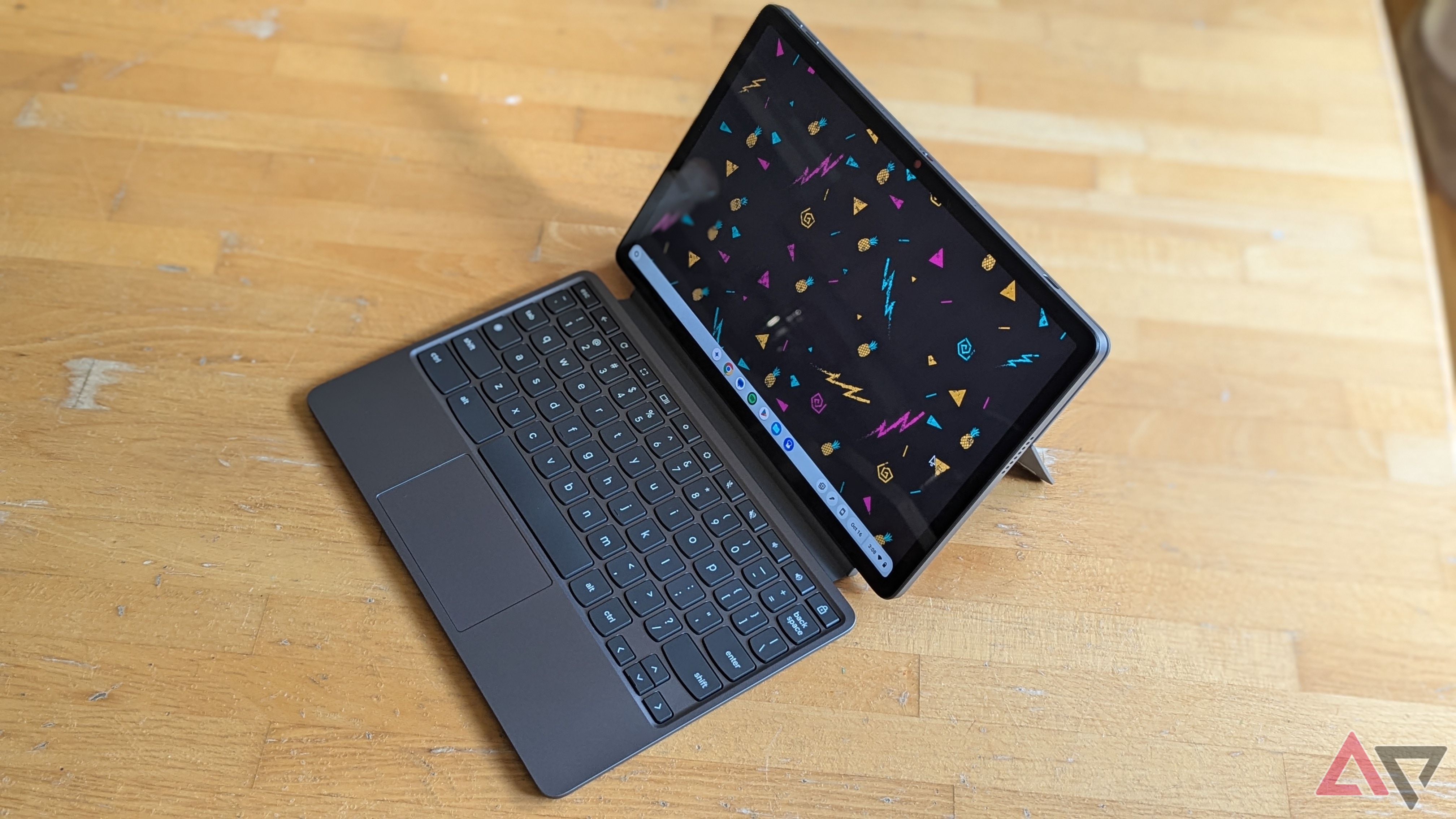 Lenovo Chromebook Duet 11 (2024) viewed from the side sitting on a wooden table