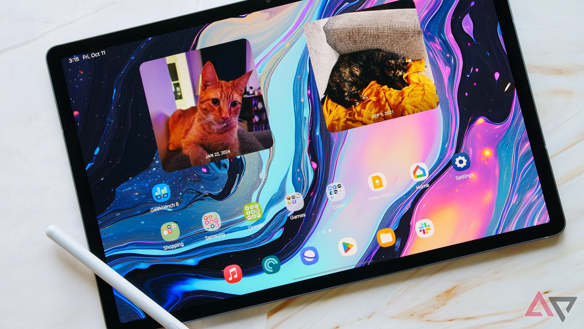 A closeup of the Galaxy Tab S10+ homescreen with the S Pen placed on top