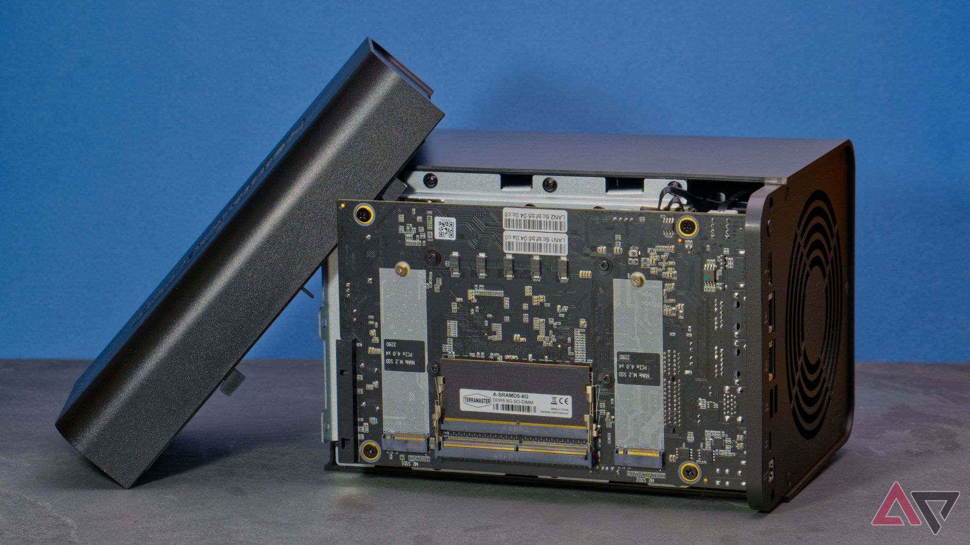 TerraMaster F4-424 Max with its cover removed to expose the mainboard with RAM and SSD slots