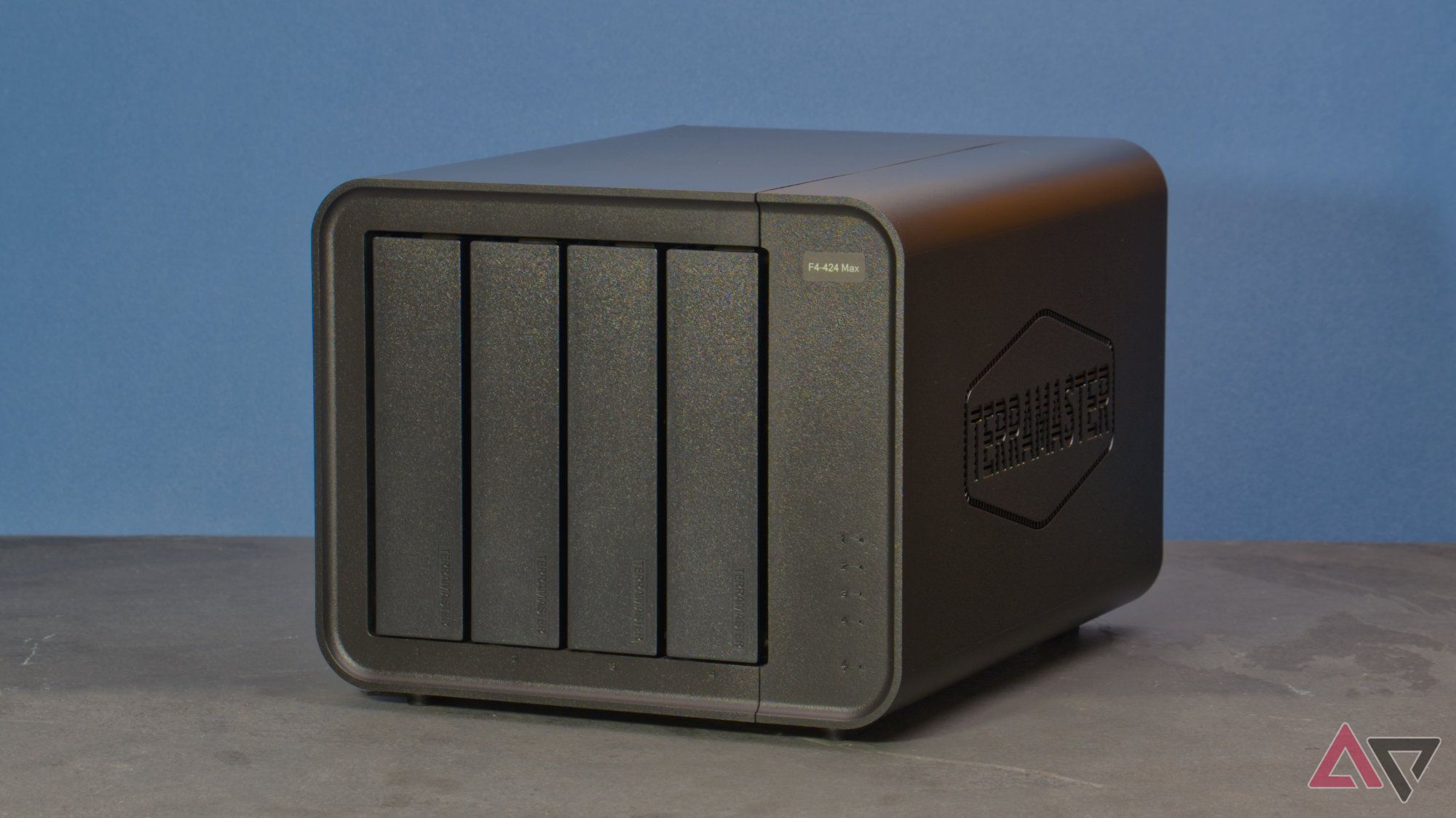 TerraMaster F4-424 Max front at an angle in front of a blue background