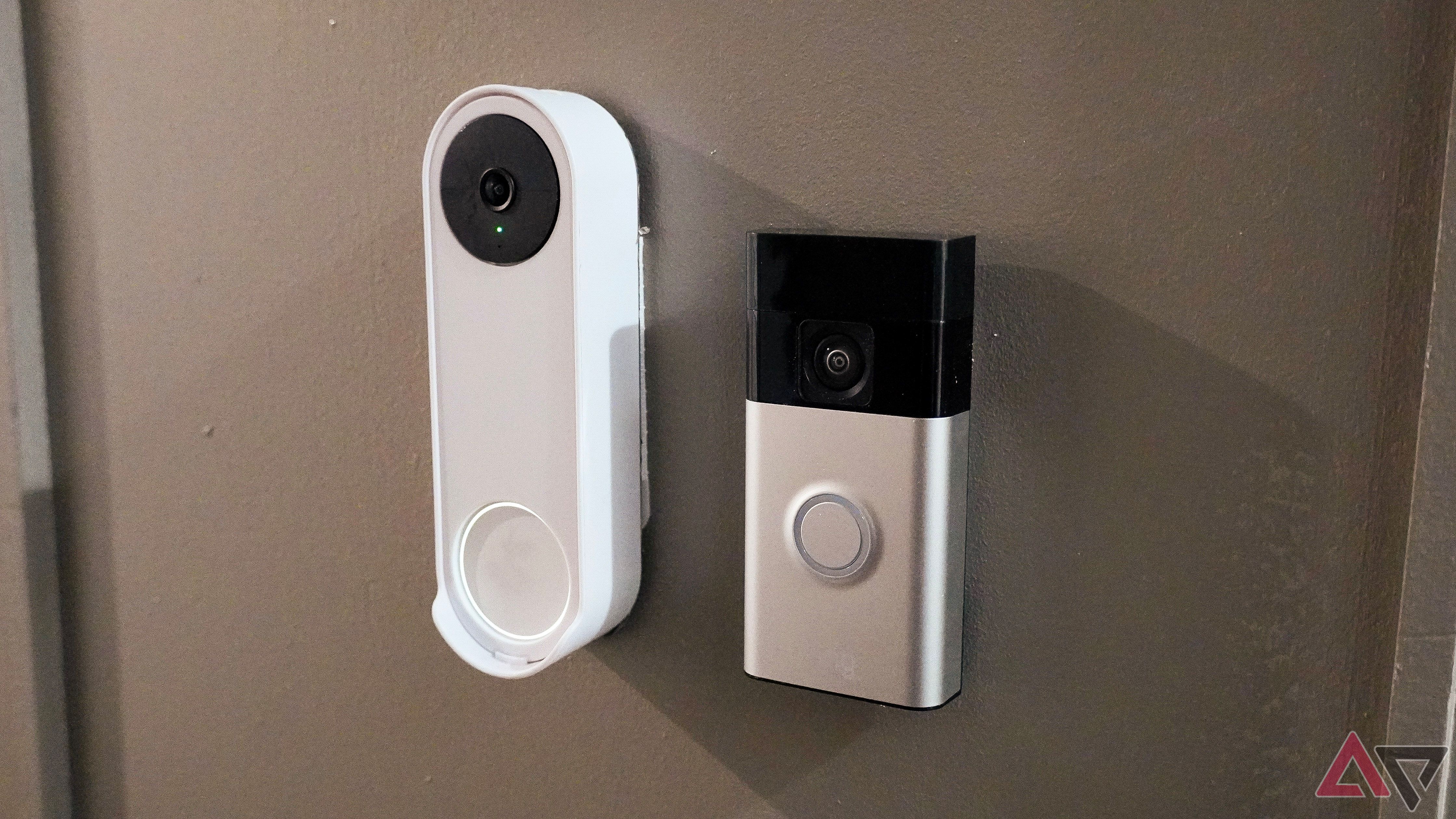 The Ring and Nest battery doorbells mounted to a door.