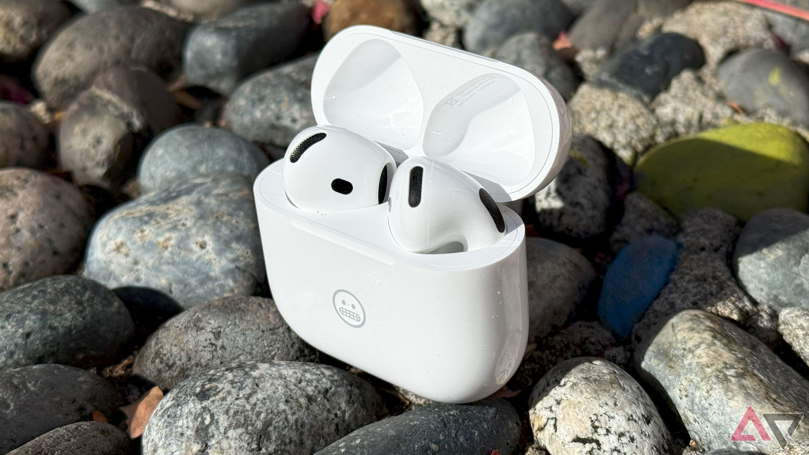 A photograph of Apple's Airpods 4, with the case open