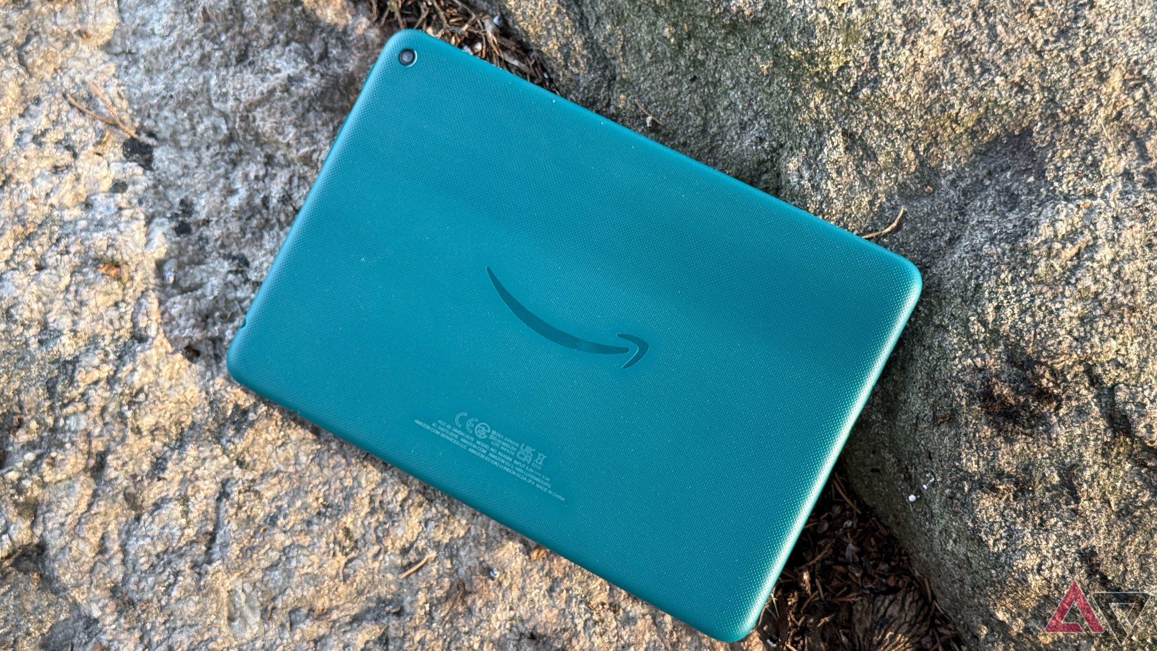 Amazon Fire HD 8's plastic back displayed on yet another rock