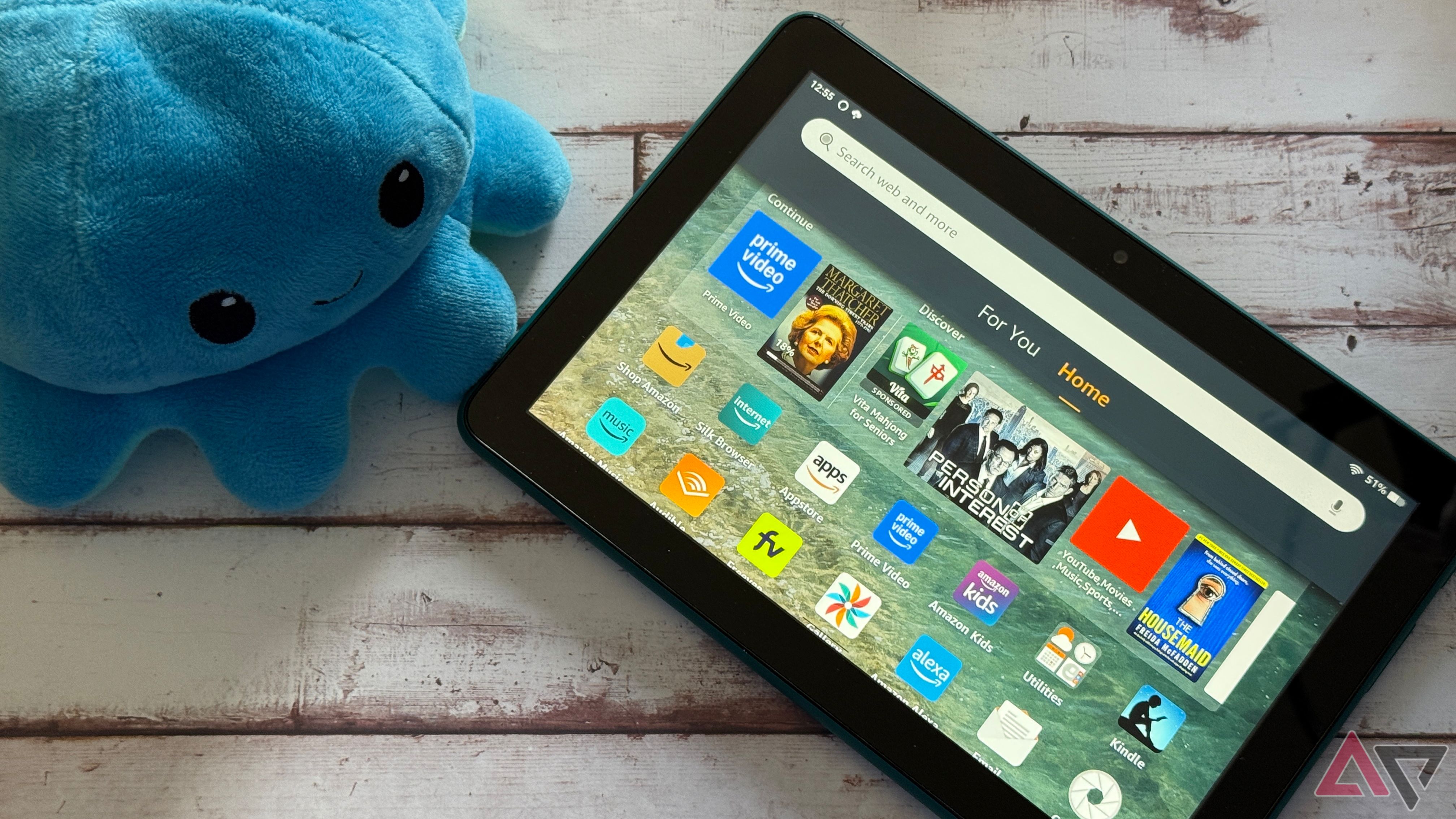 Homescreen of the Amazon Fire HD 8 with a plushie