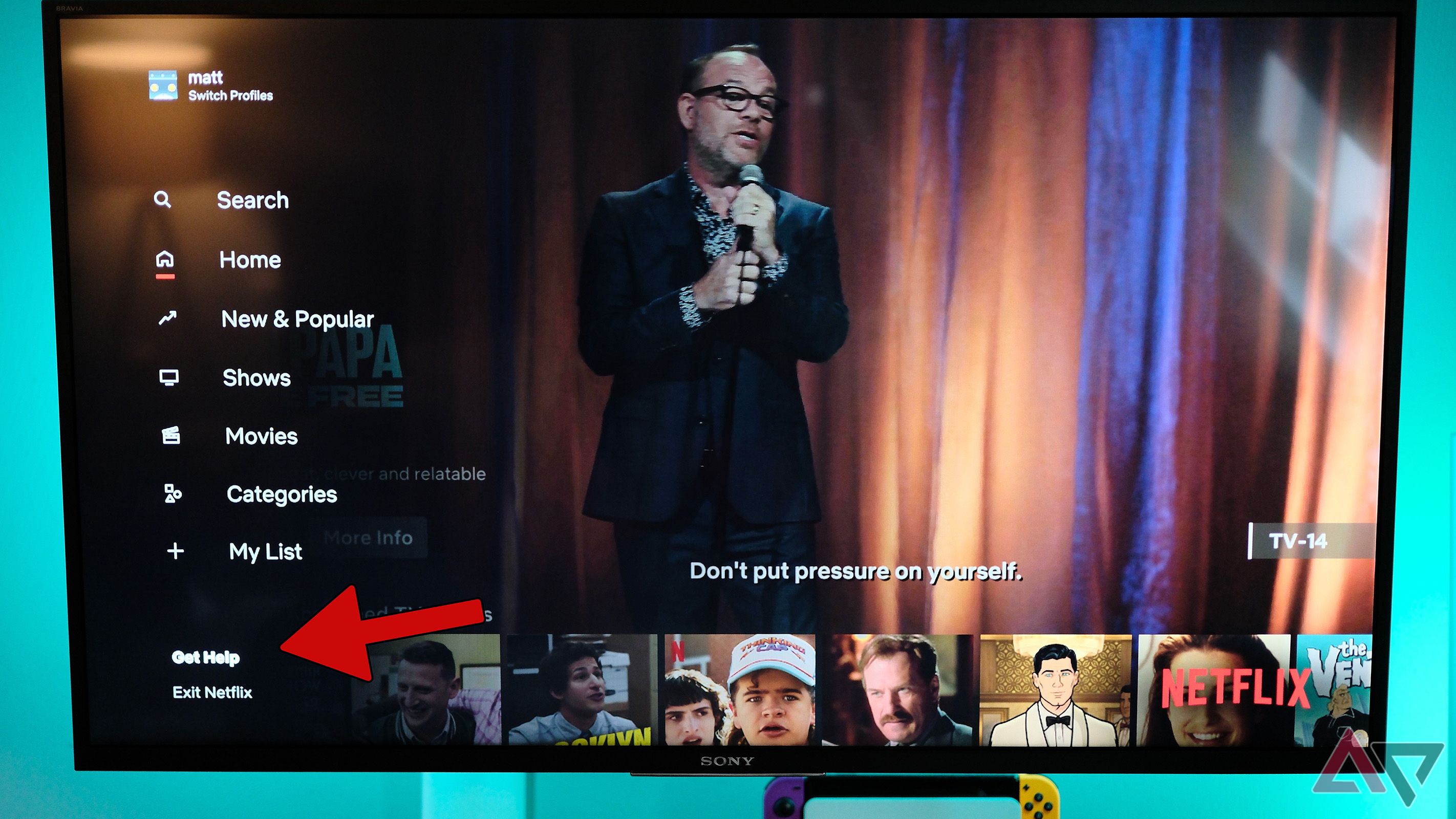 the netflix app on a smart tv with sidebar open and red arrow pointing at get help button