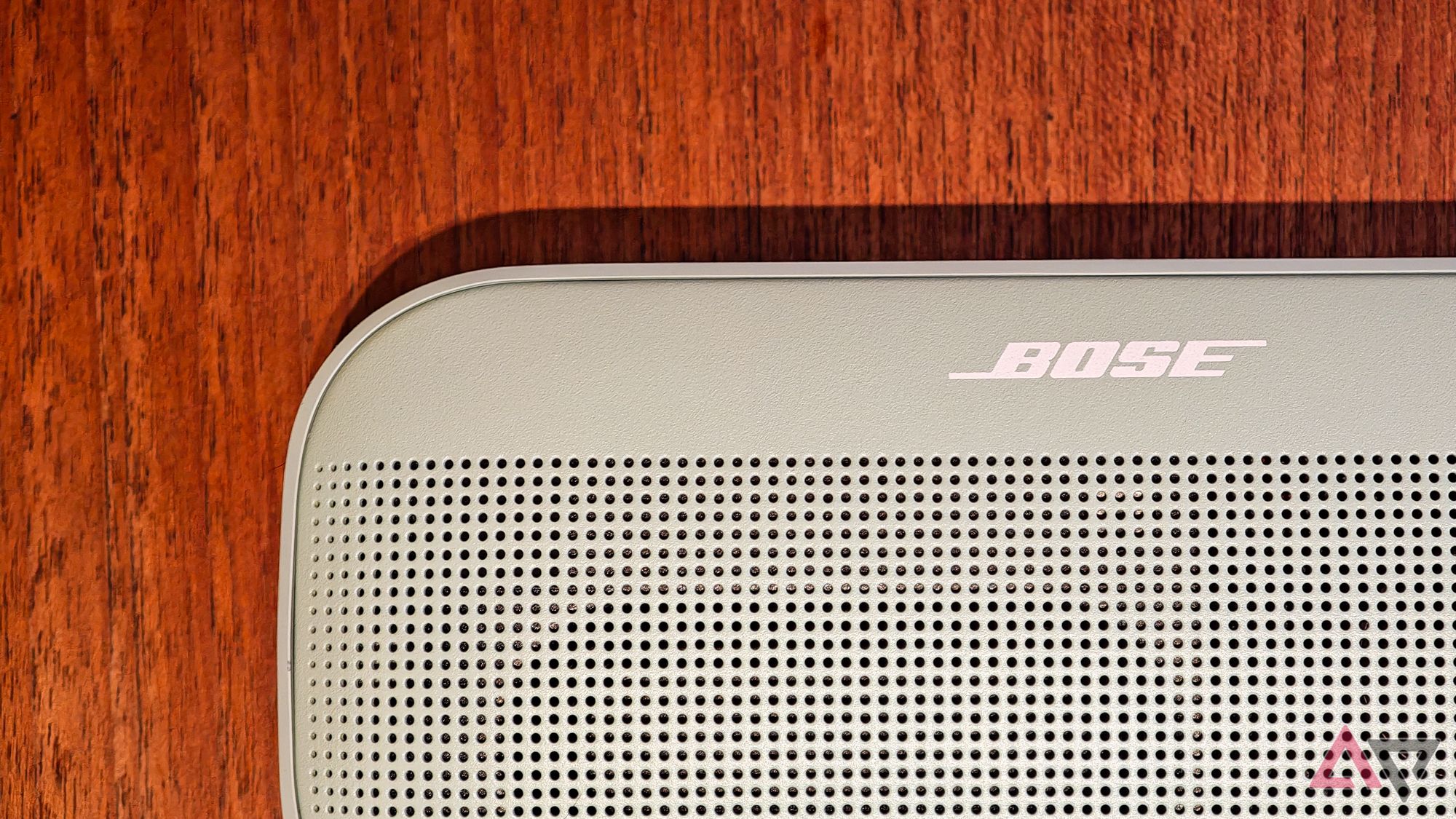 Bose SoundLink Flex 2 speaker on a wooden table