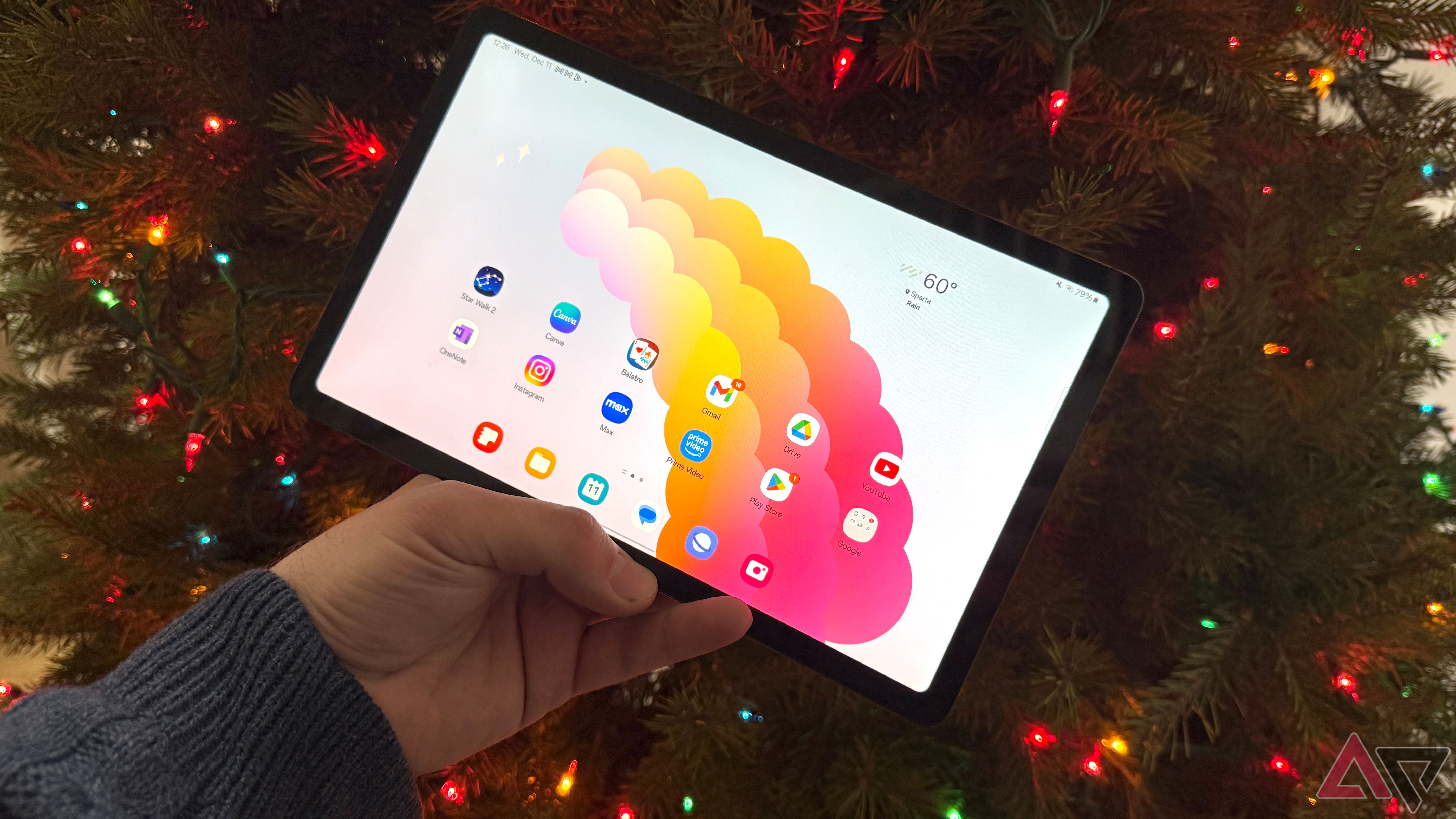 Galaxy Tab S6 Lite in front of a Christmas tree