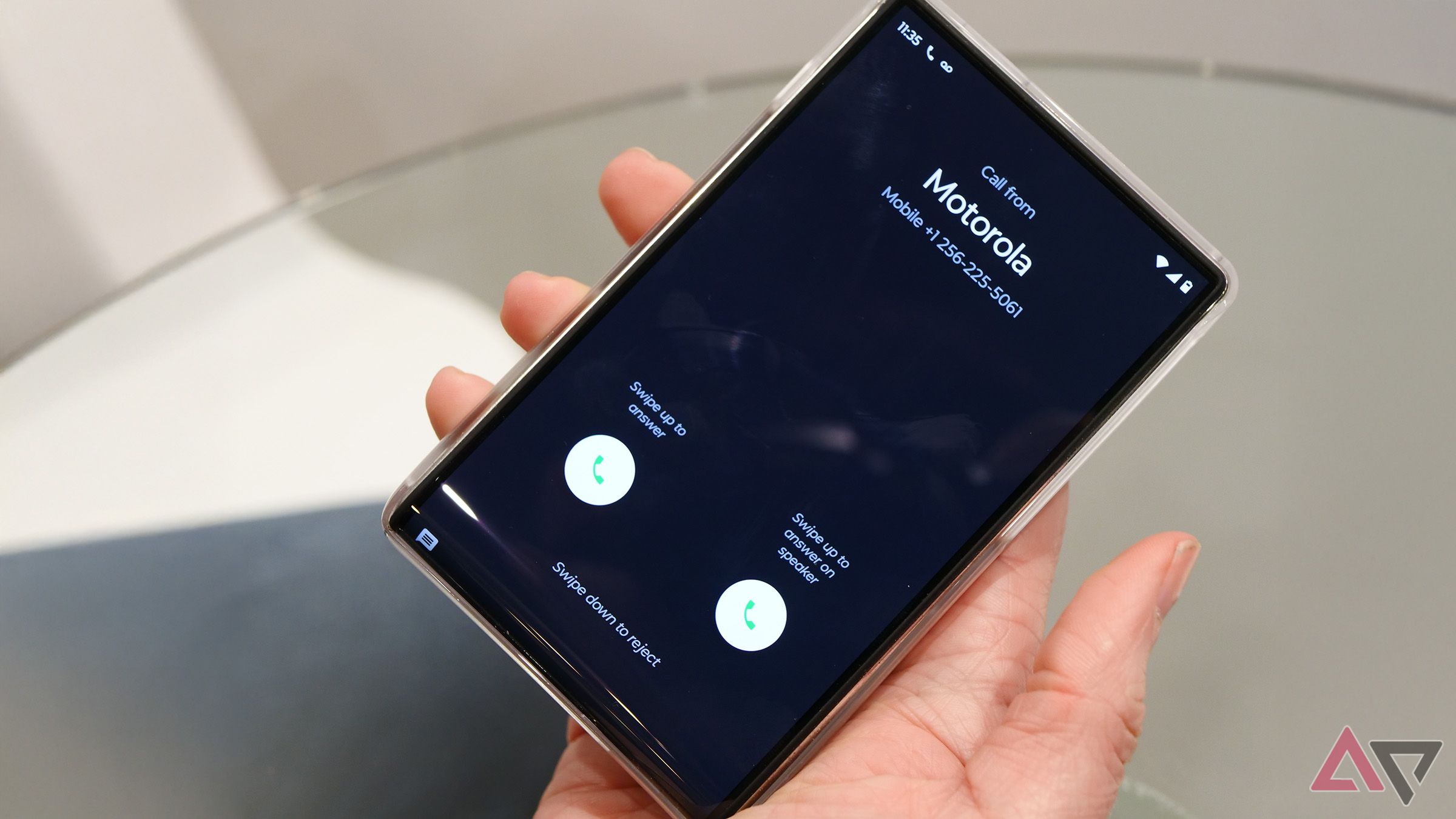 motorola rizr rollable phone concept in hand displaying incoming call