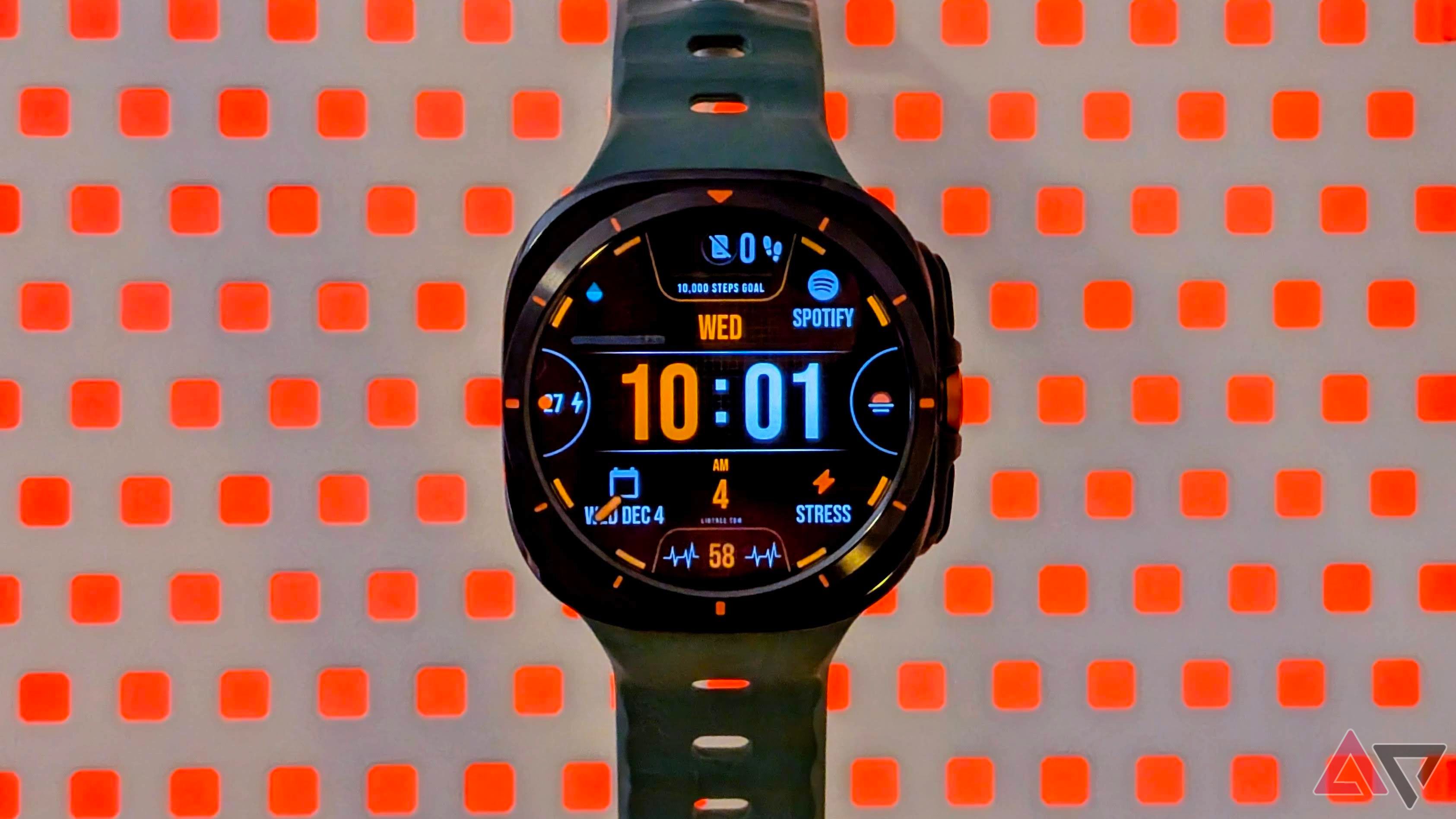 Samsung Galaxy Watch Ultra in front of a grid with orange squares