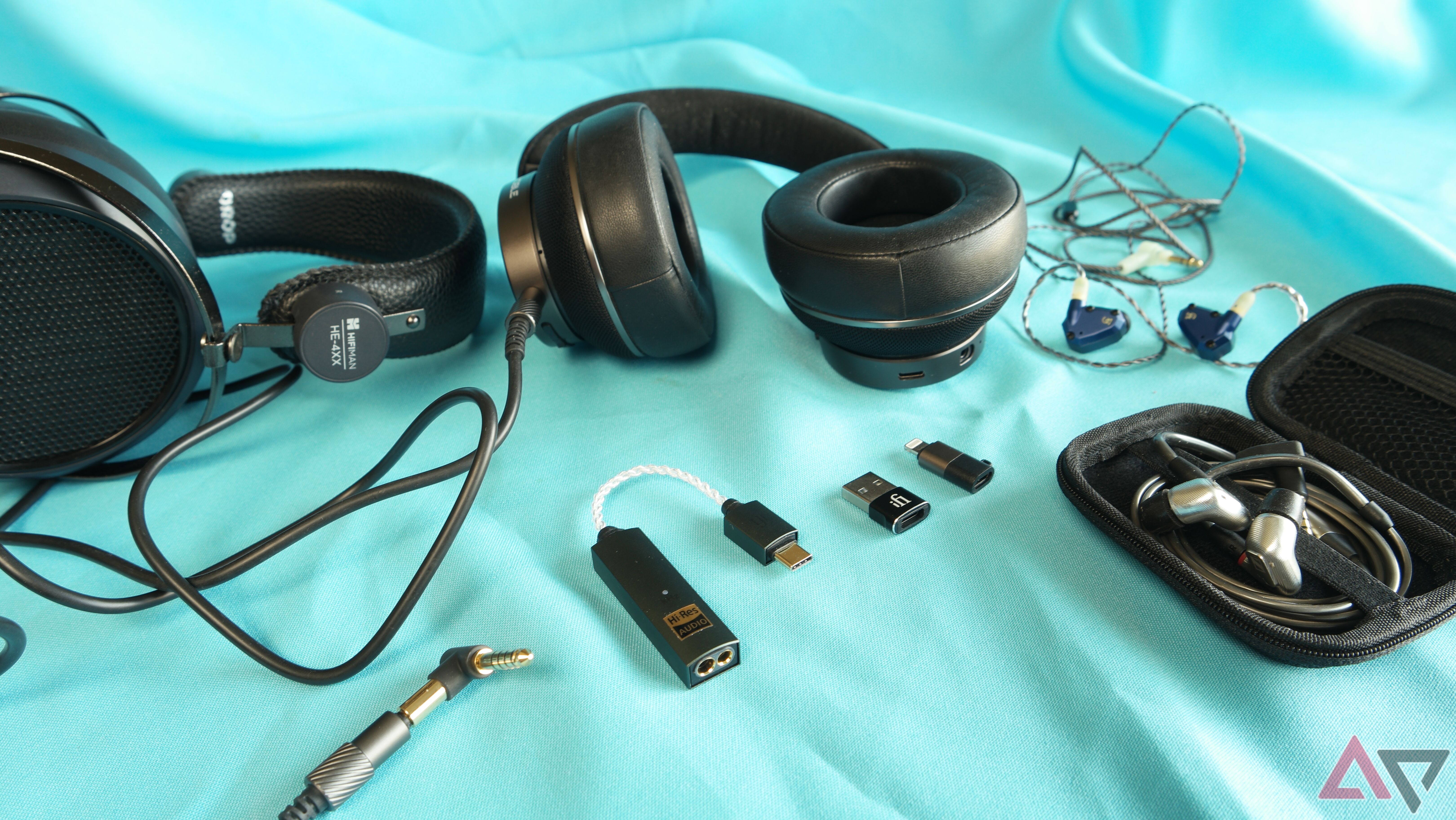 iFi Go Link Max shown with HiFiMan, Noble Audio, Sennheiser, and Campfire Audio headphones and IEMs