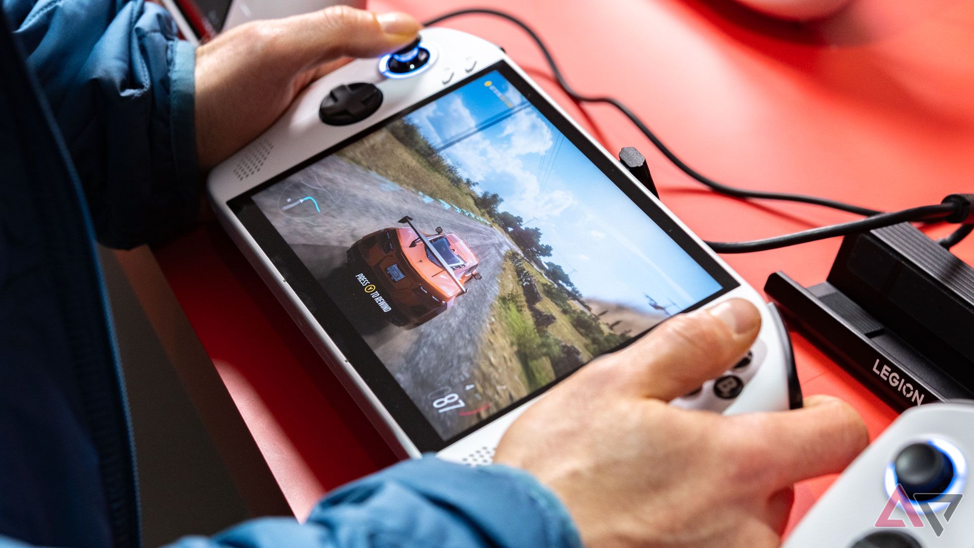 Forza Horizon 5 running on a white handheld gaming PC