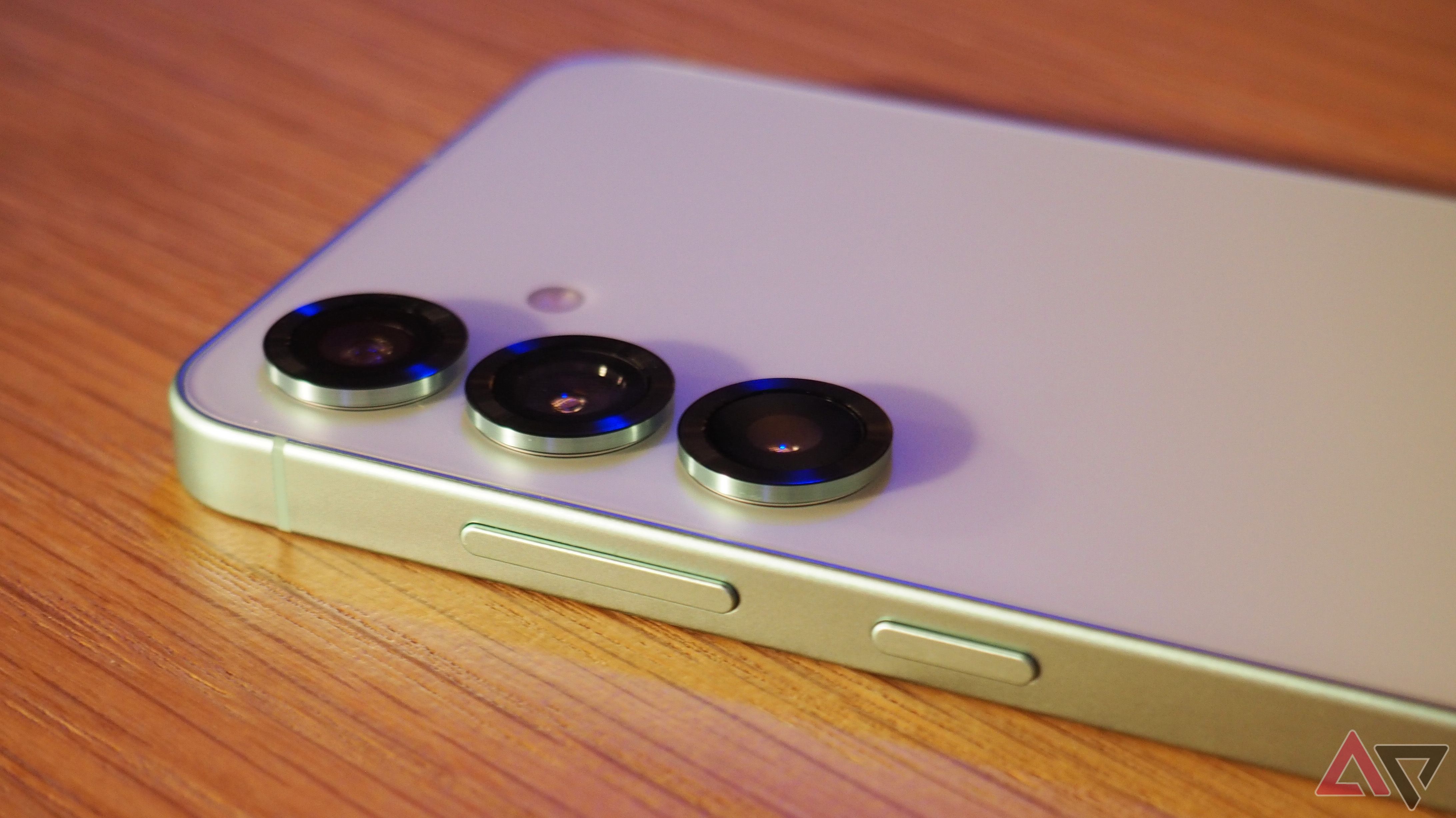 The Samsung Galaxy S25 on a desk showing the rear of the phone