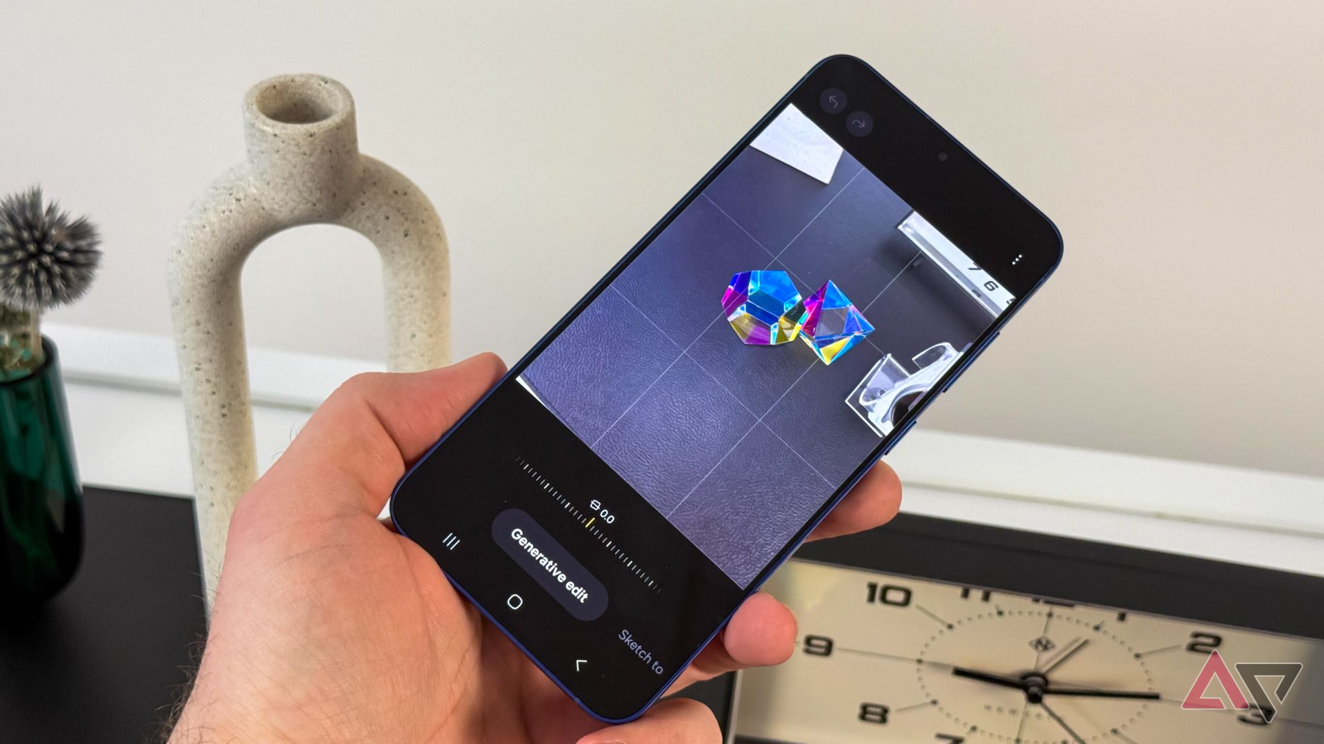 The Samsung Galaxy S25 in someone's hand at a Samsung hands on event