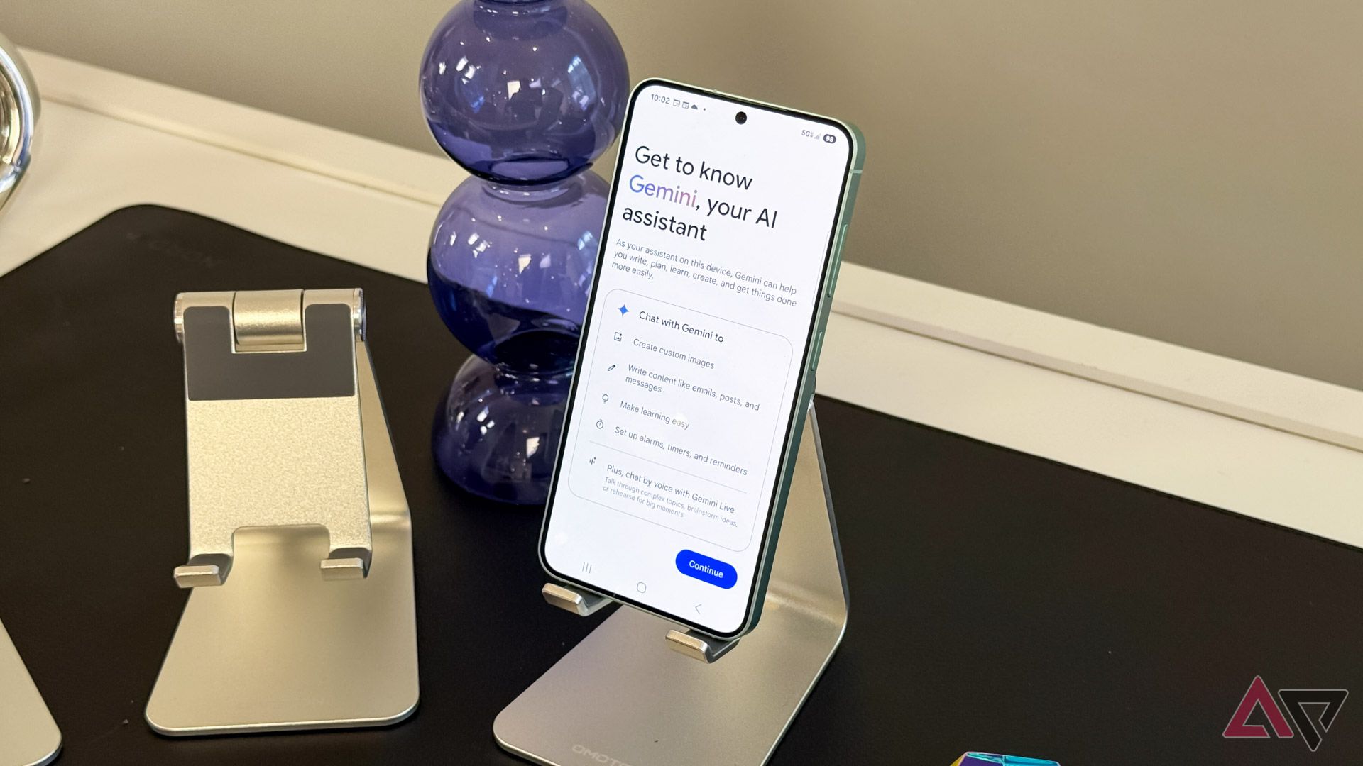 The Samsung Galaxy S25 on a desk showing the screen of the phone