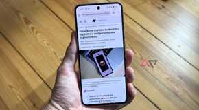Chrome displayed on a Pixel 8 held in a hand with a wood background.