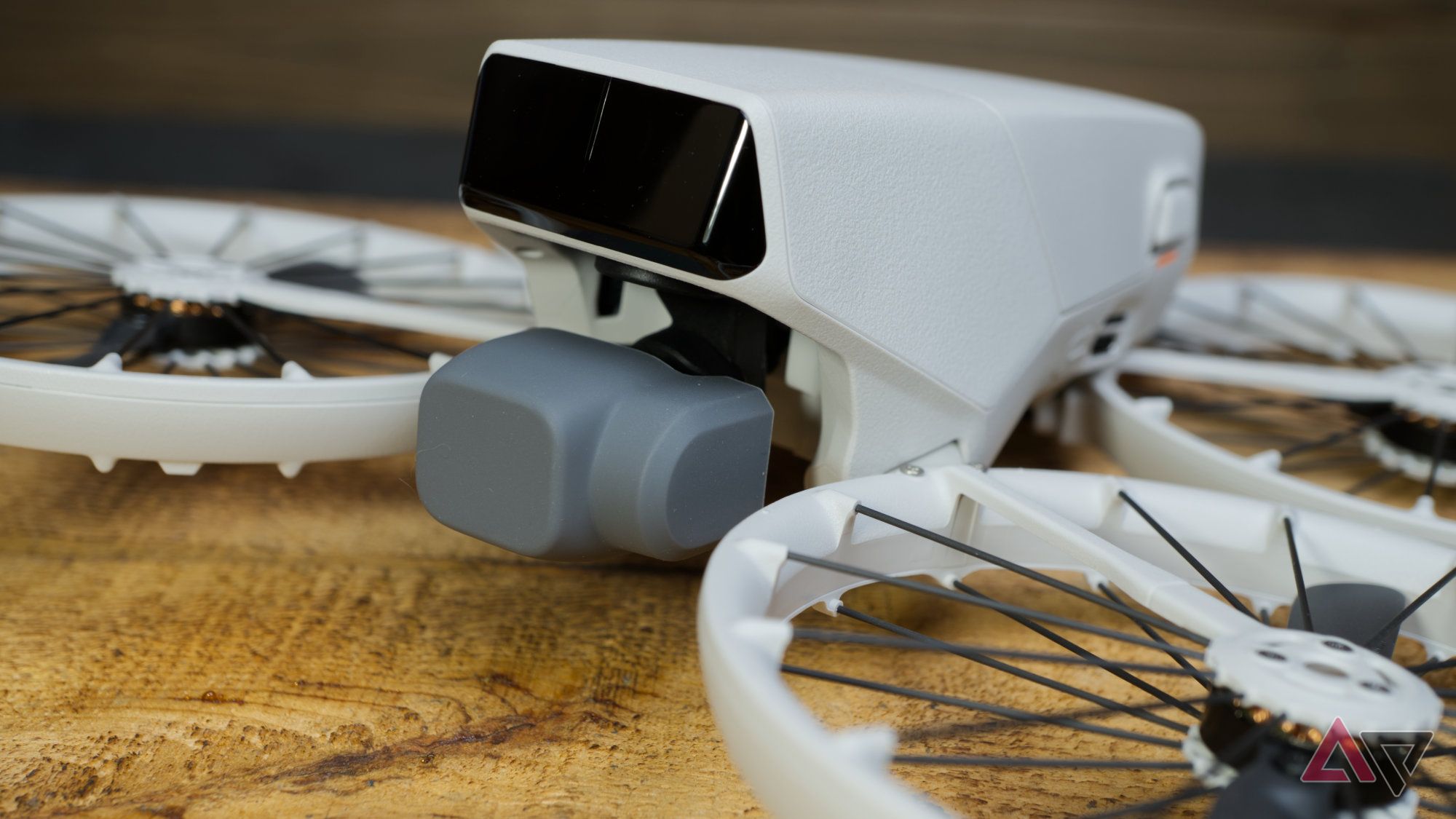 DJI Flip camera and gimbal with just a soft rubber lens cover installed