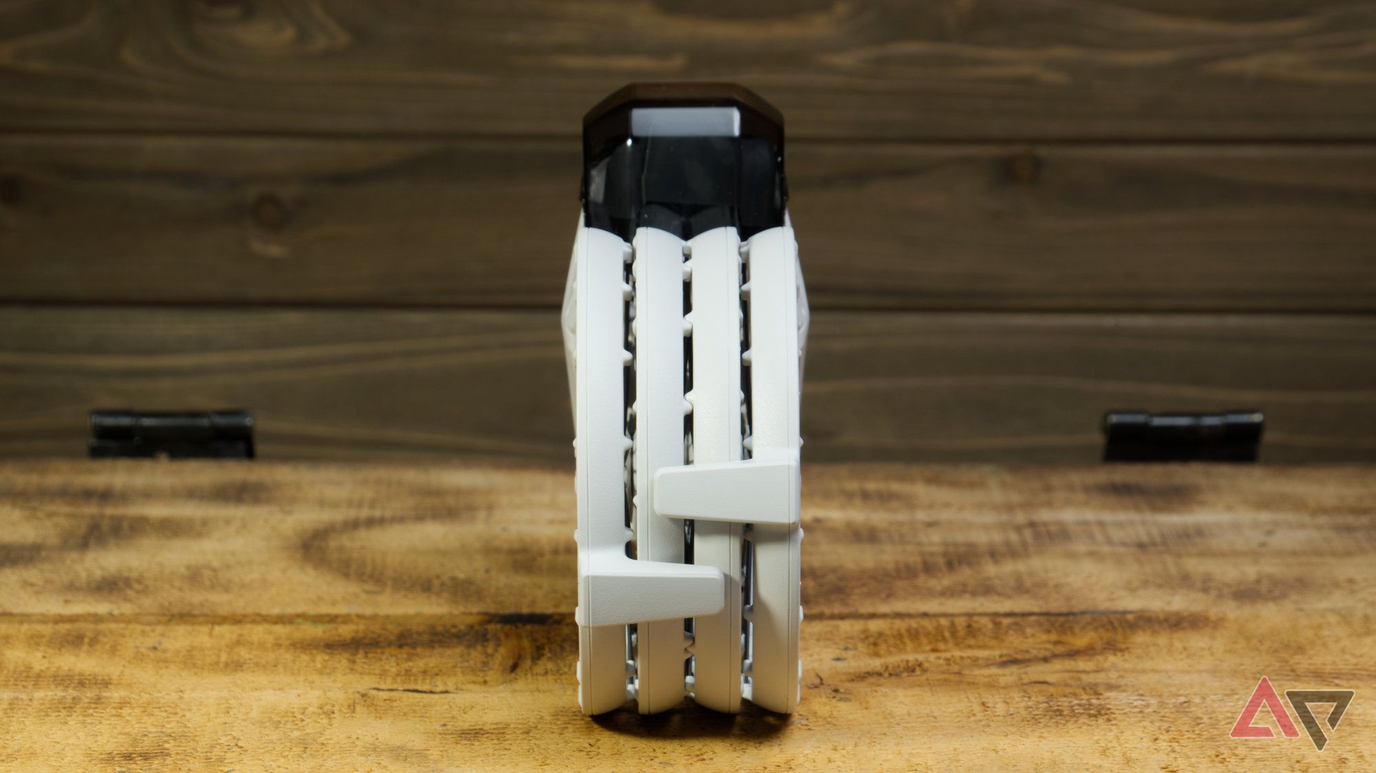 DJI Flip with wings folded down, viewed straight on at the bottom