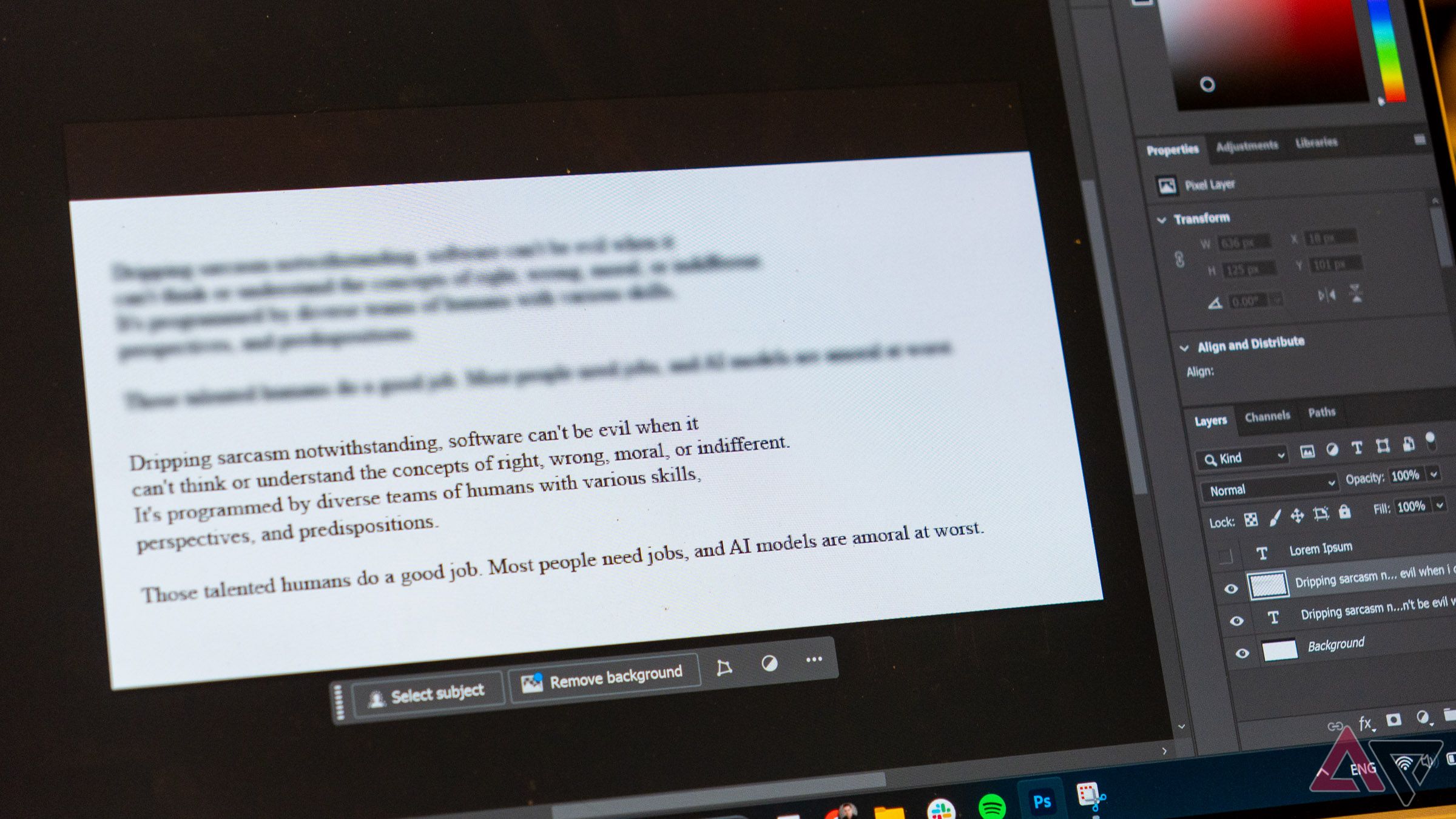 an image of blurry text opened in photoshop on a laptop