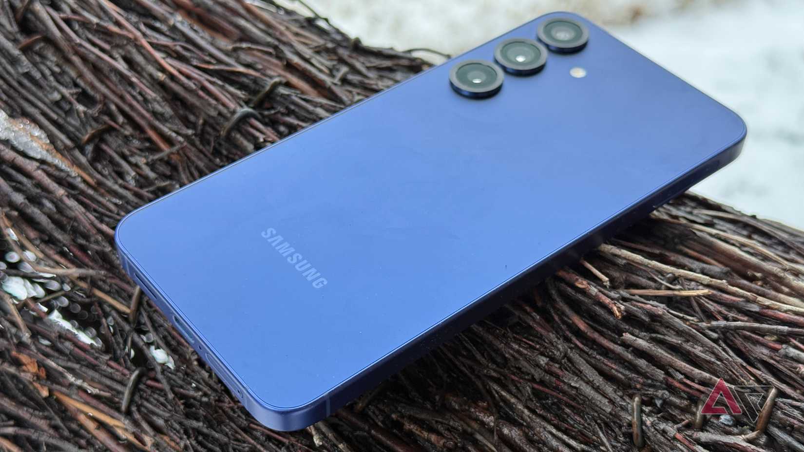 Samsung Galaxy S25+ sitting on back of wooden deer