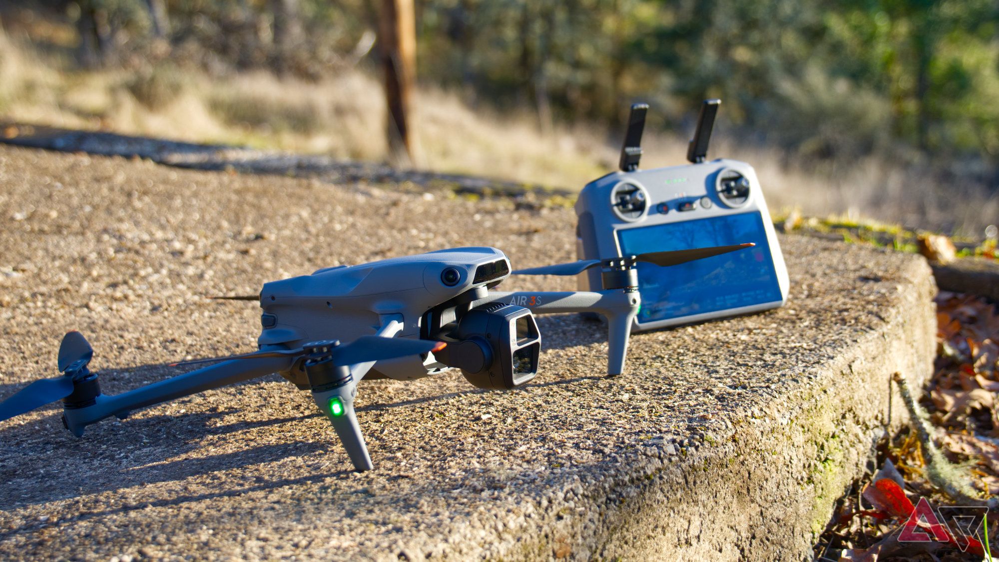 DJI Air 3S on a concrete slab at sunset