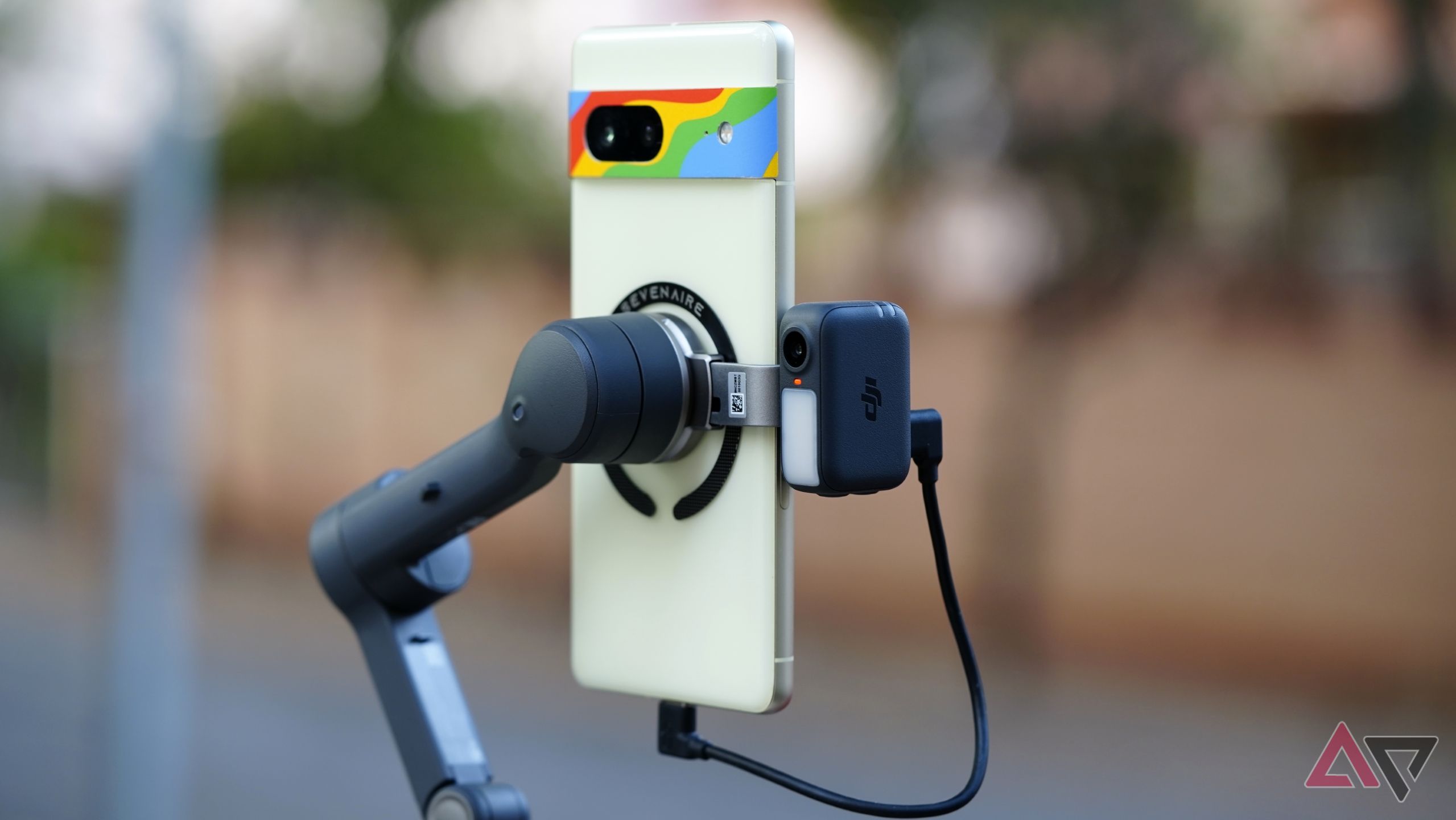 Multifunctional Module attached to the side of a DJI Osmo Mobile 7 Pro